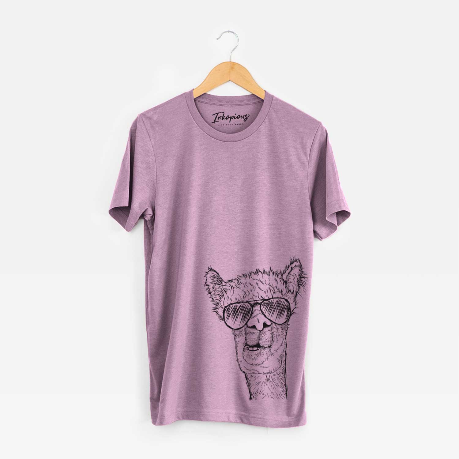 Hand-drawn sketch of Henry the Alpaca wearing aviator sunglasses on an Orchid Bella Canvas Unisex Crewneck