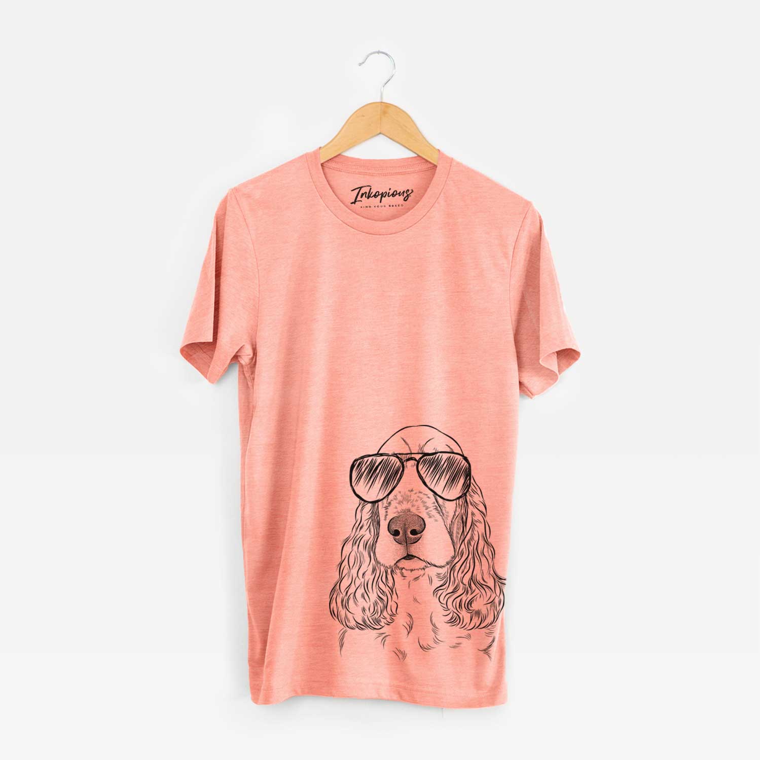 Hand-drawn sketch of Henry the English Cocker Spaniel wearing aviator sunglasses on a Sunset Unisex crewneck