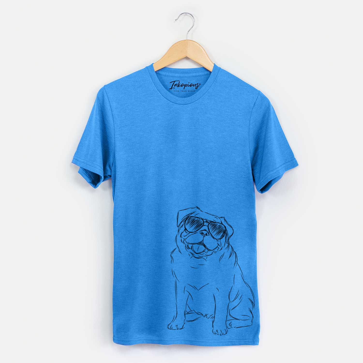 Hand-drawn sketch of Higgins the Pug wearing aviator sunglasses on a Blue Unisex crewneck
