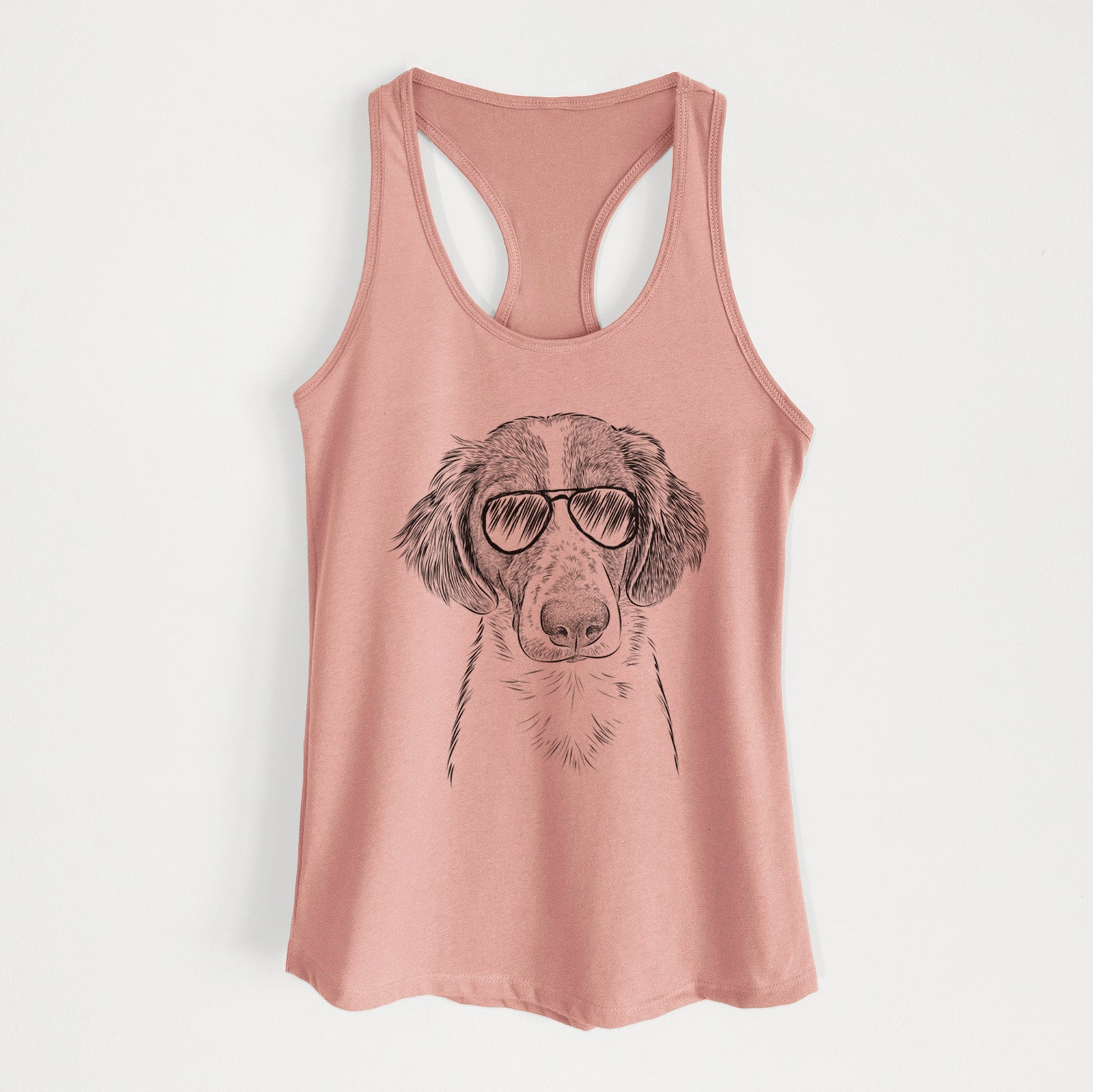 Hand-drawn sketch of Holly the Brittany Spaniel wearing aviator sunglasses on a Desert Pink Women's racerback tanktop