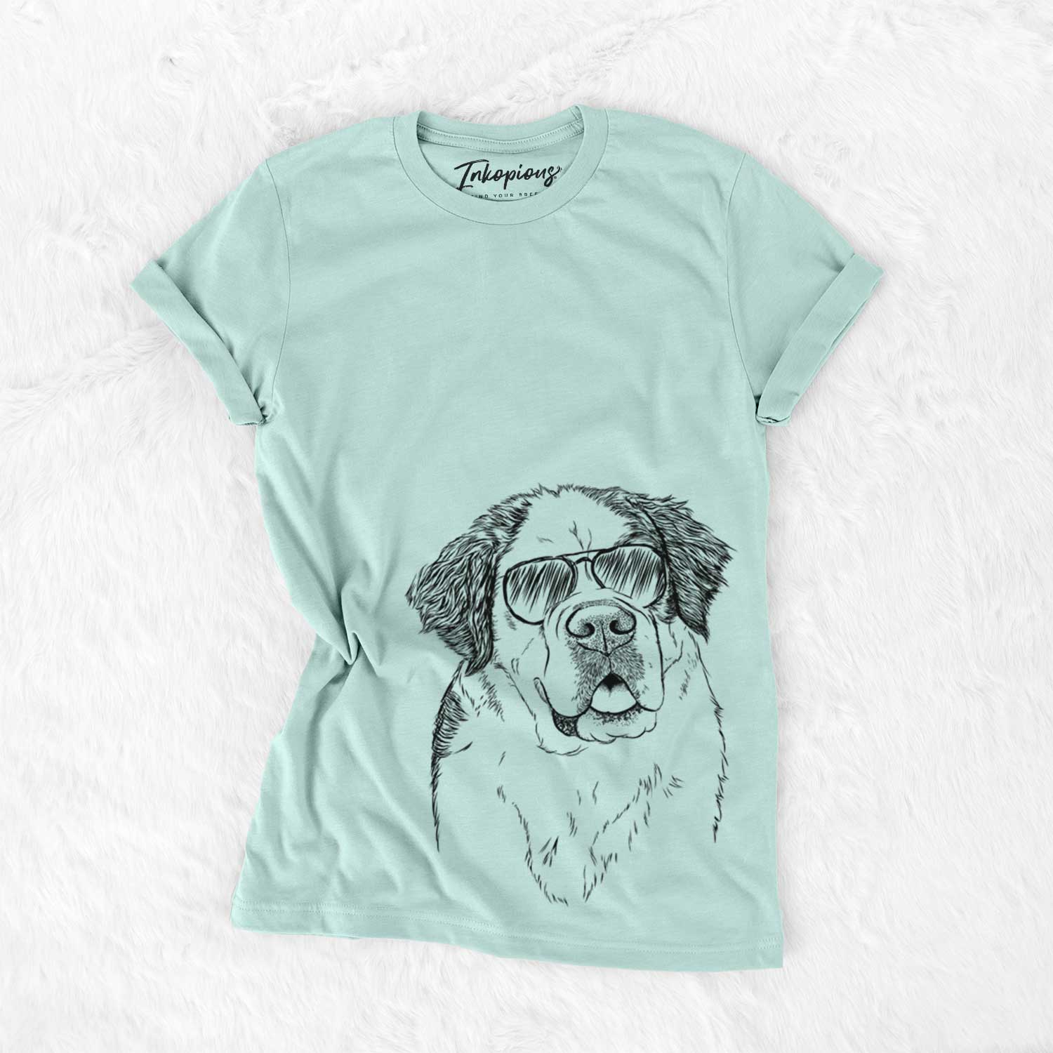 Hand-drawn sketch of Hook the Saint Bernard wearing aviator sunglasses on a Heather Sage Unisex crewneck
