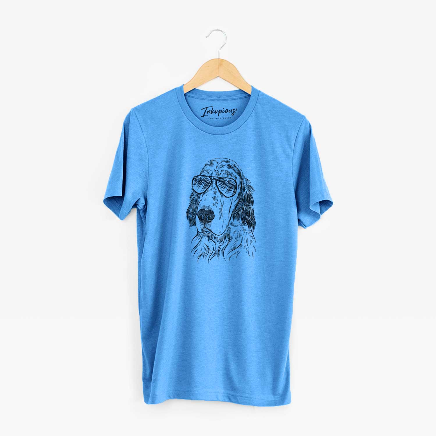 Hand-drawn sketch of Hutch the English Setter wearing aviator sunglasses on a Blue Unisex crewneck