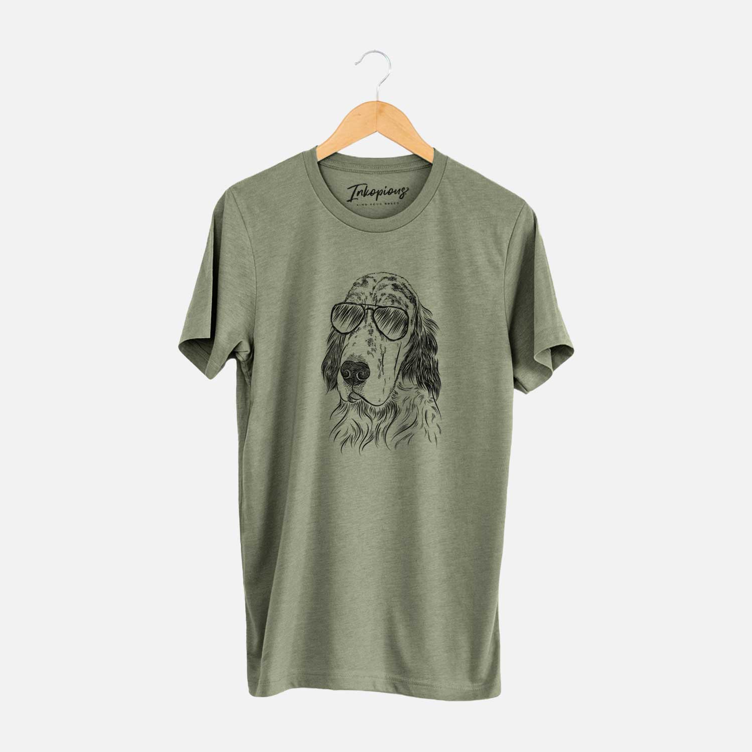 Hand-drawn sketch of Hutch the English Setter wearing aviator sunglasses on an Olive Unisex crewneck