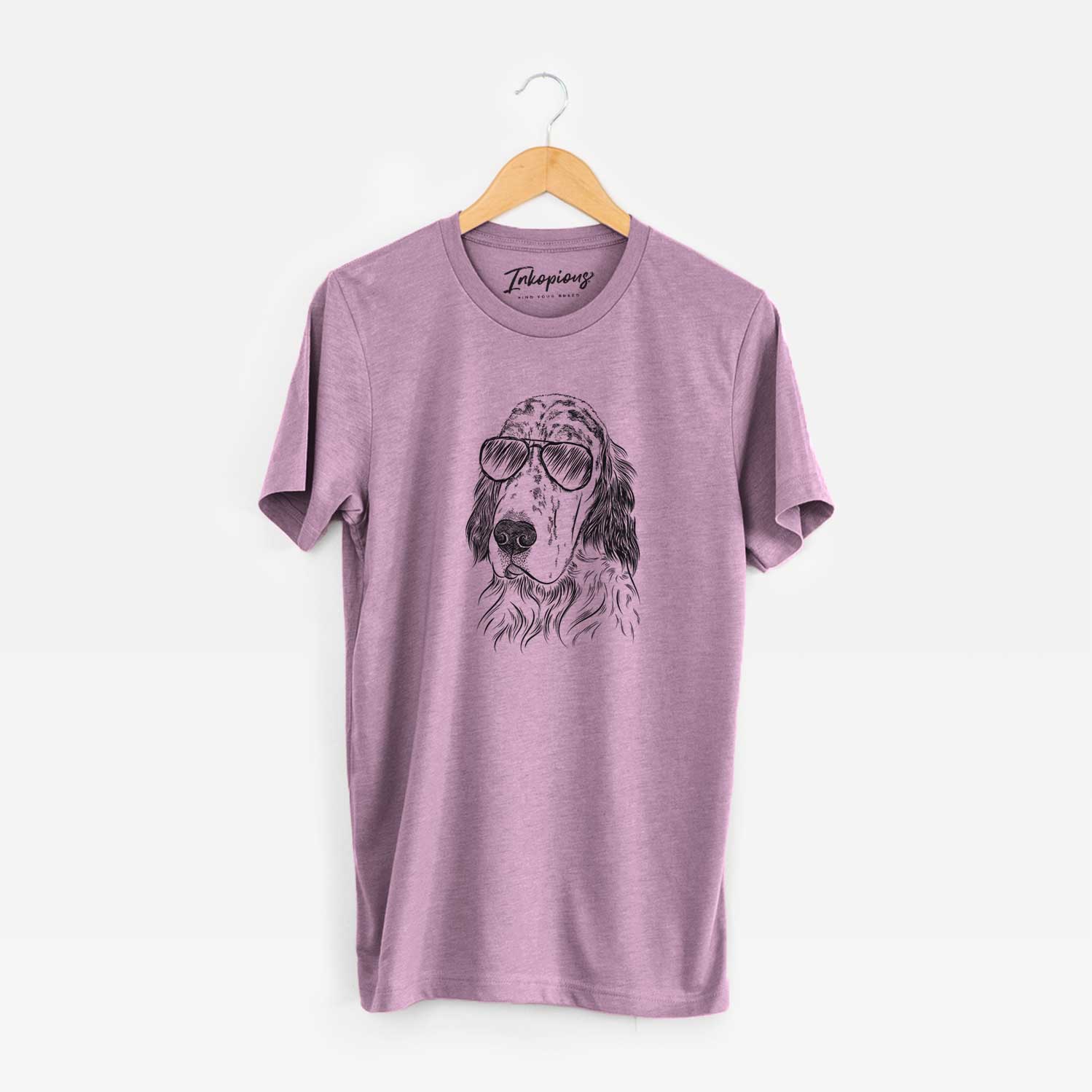 Hand-drawn sketch of Hutch the English Setter wearing aviator sunglasses on an Orchid Unisex crewneck