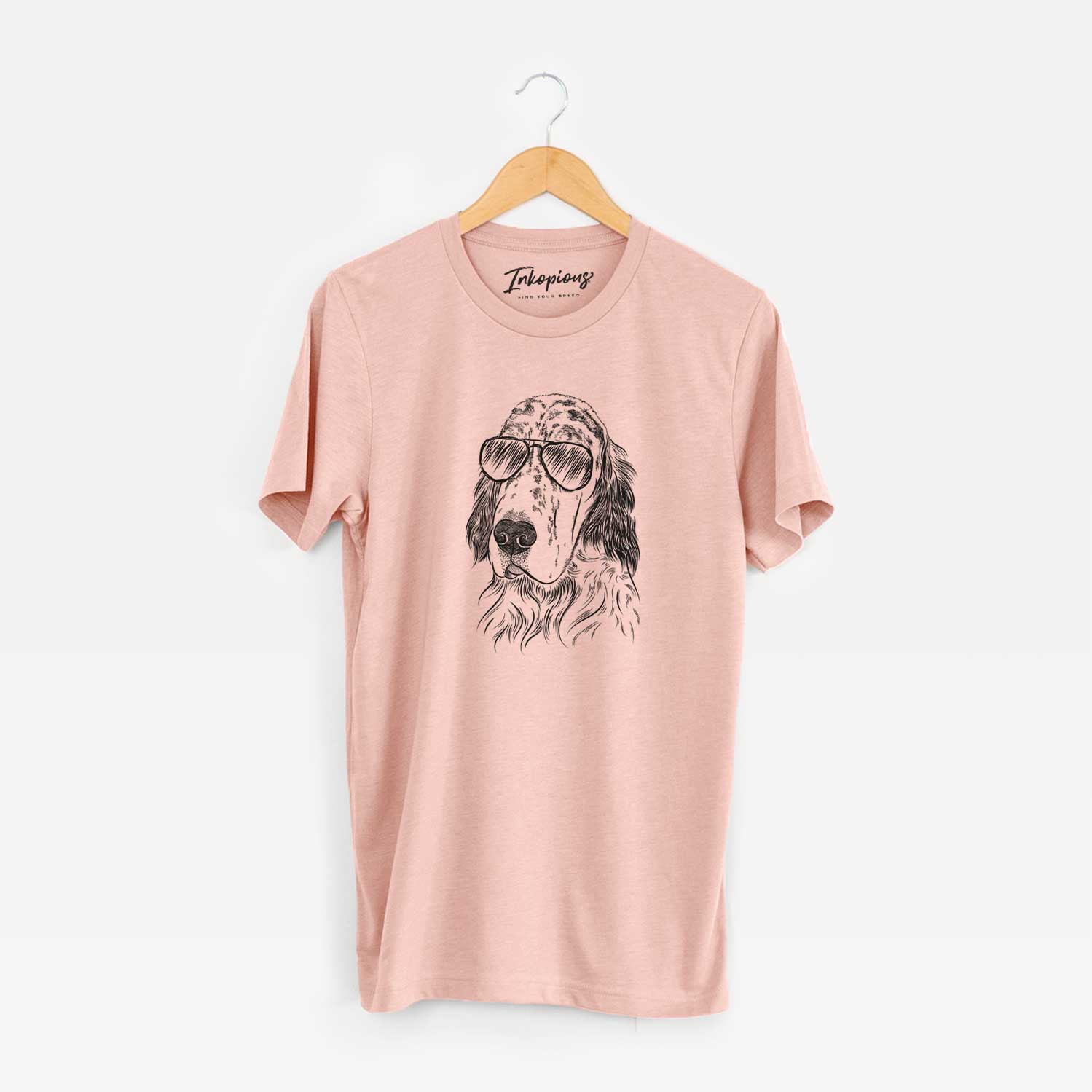Hand-drawn sketch of Hutch the English Setter wearing aviator sunglasses on a Peach Unisex crewneck