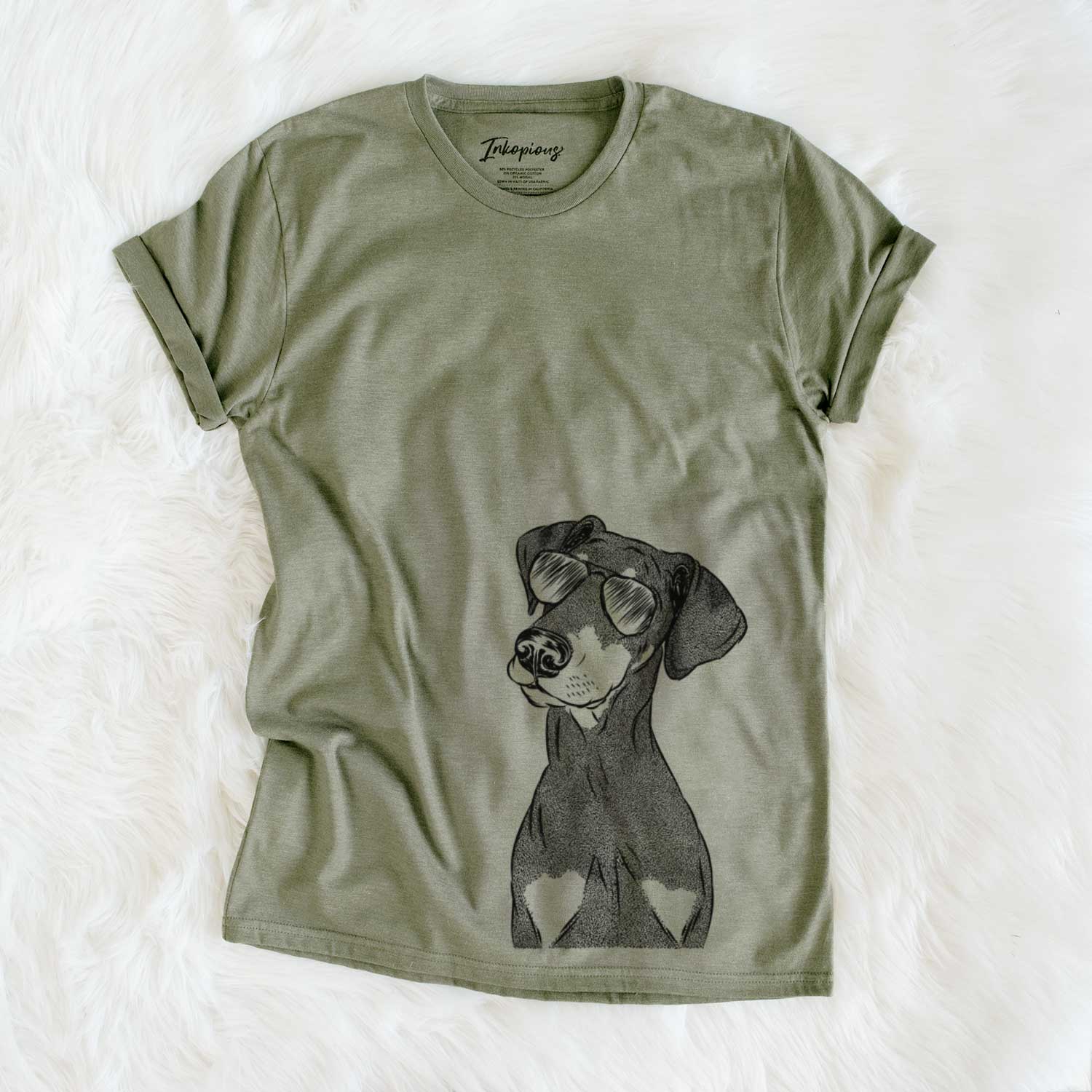 Hand-drawn sketch of Iroh the Doberman Pinscher wearing aviator sunglasses on an Olive Unisex crewneck