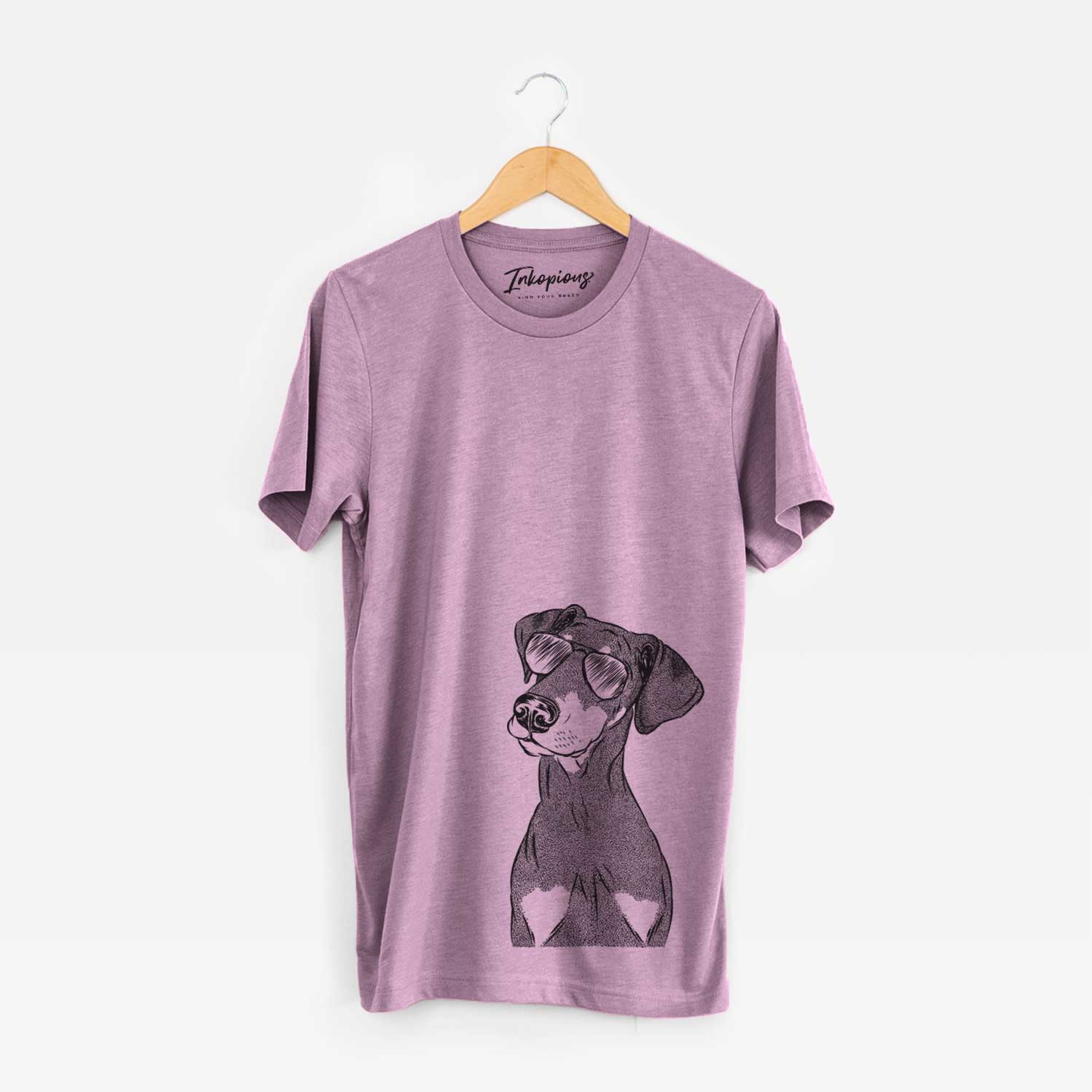 Hand-drawn sketch of Iroh the Doberman Pinscher wearing aviator sunglasses on an Orchid Unisex crewneck