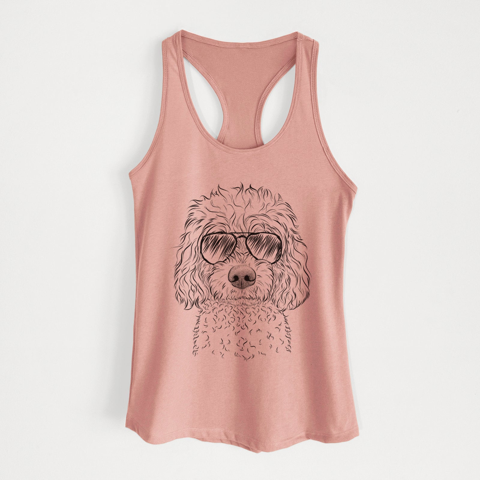 Hand-drawn sketch of Izzie the Cavachon wearing aviator sunglasses on a Desert Pink Women's racerback tanktop