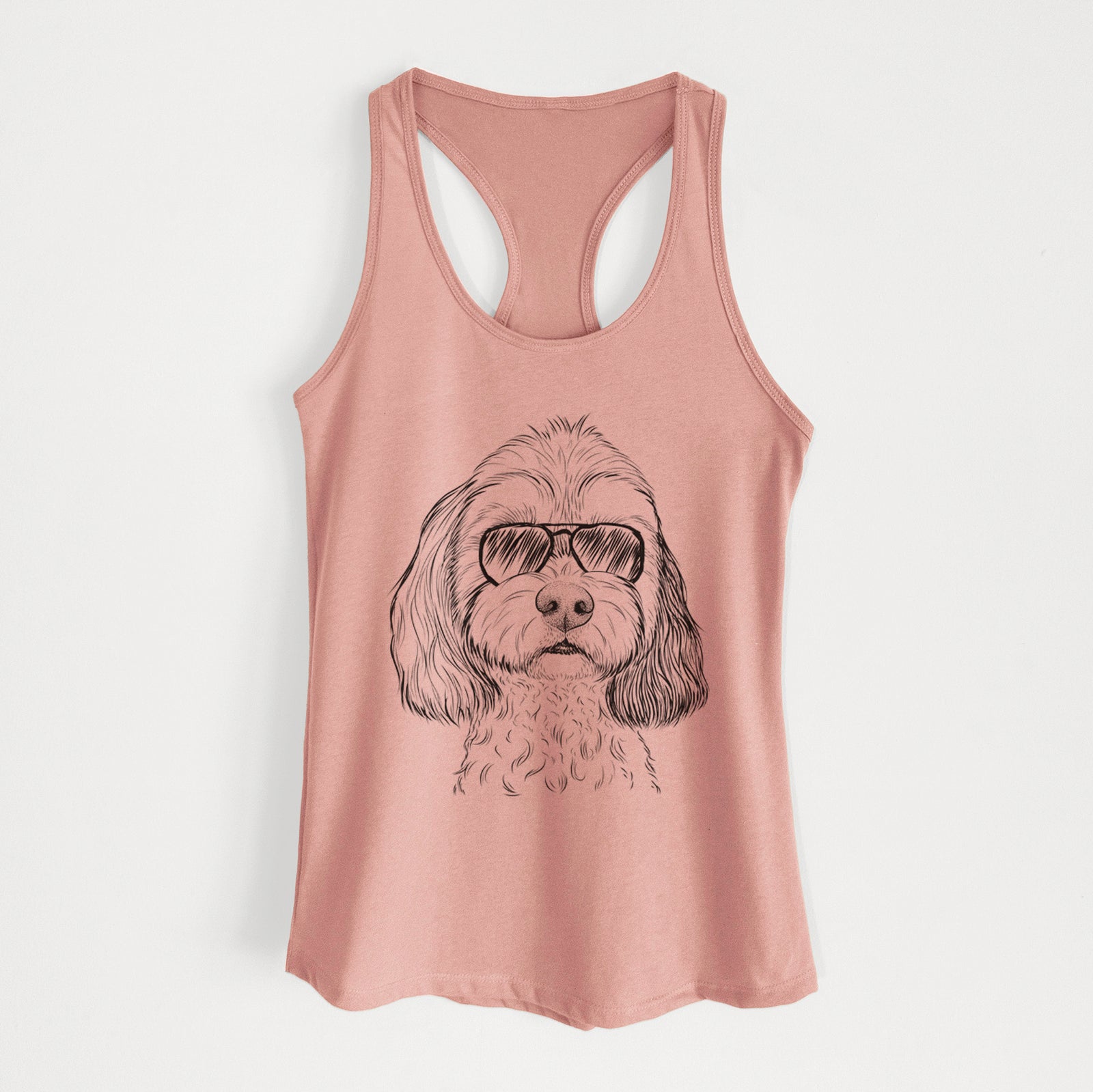 Hand-drawn sketch of Jasper Diggins the Cavapoo wearing aviator sunglasses on a Desert Pink Women's racerback tanktop