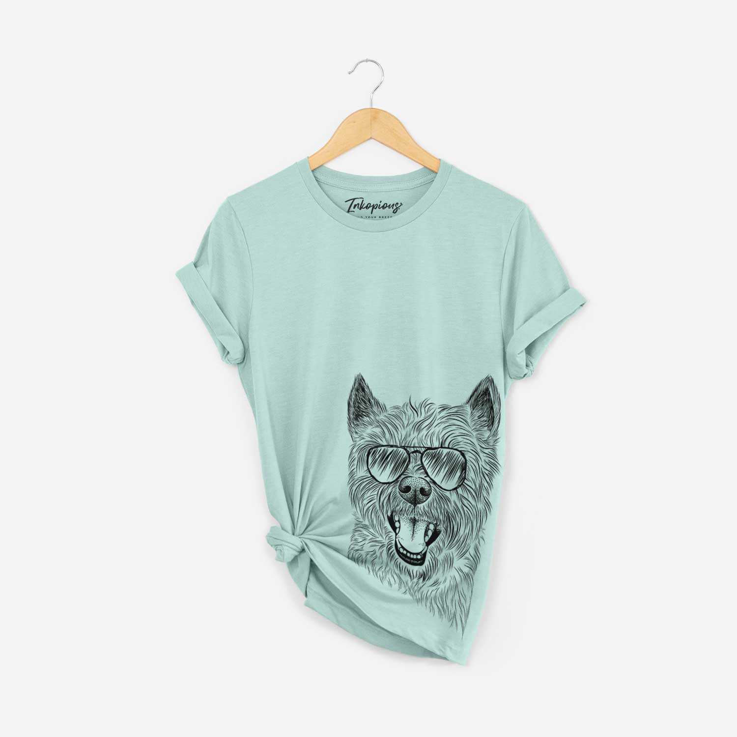 Hand-drawn sketch of Jeff the Cairn Terrier wearing aviator sunglasses on a Heather Sage Bella Canvas Unisex Crewneck