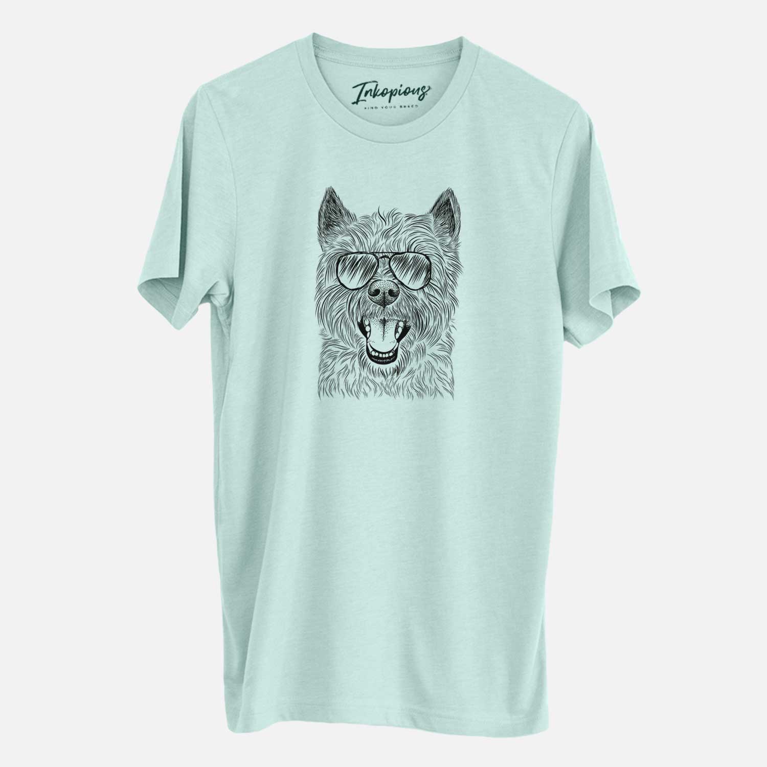 Hand-drawn sketch of Jeff the Cairn Terrier wearing aviator sunglasses on a Heather Sage Unisex crewneck