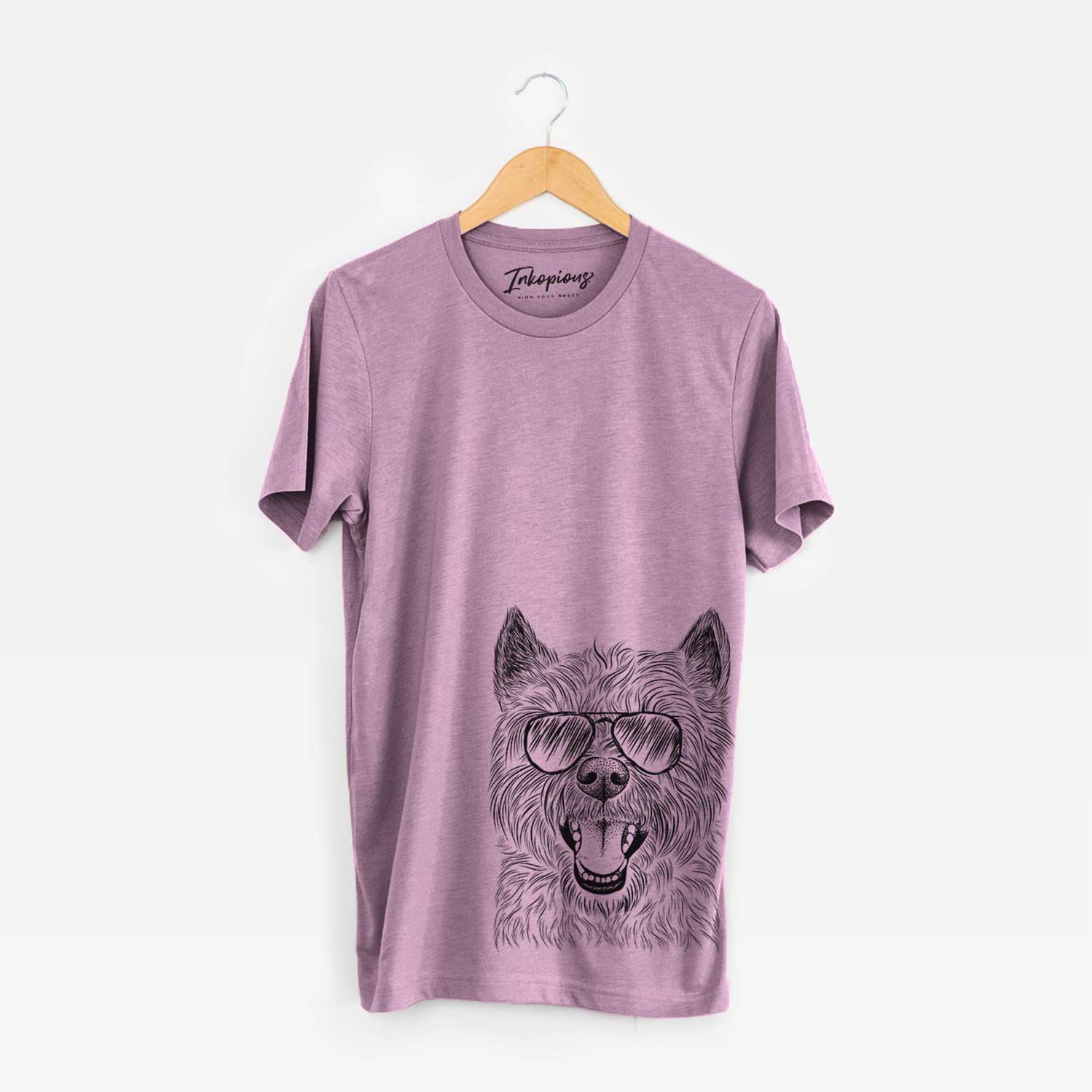 Hand-drawn sketch of Jeff the Cairn Terrier wearing aviator sunglasses on an Orchid Bella Canvas Unisex Crewneck