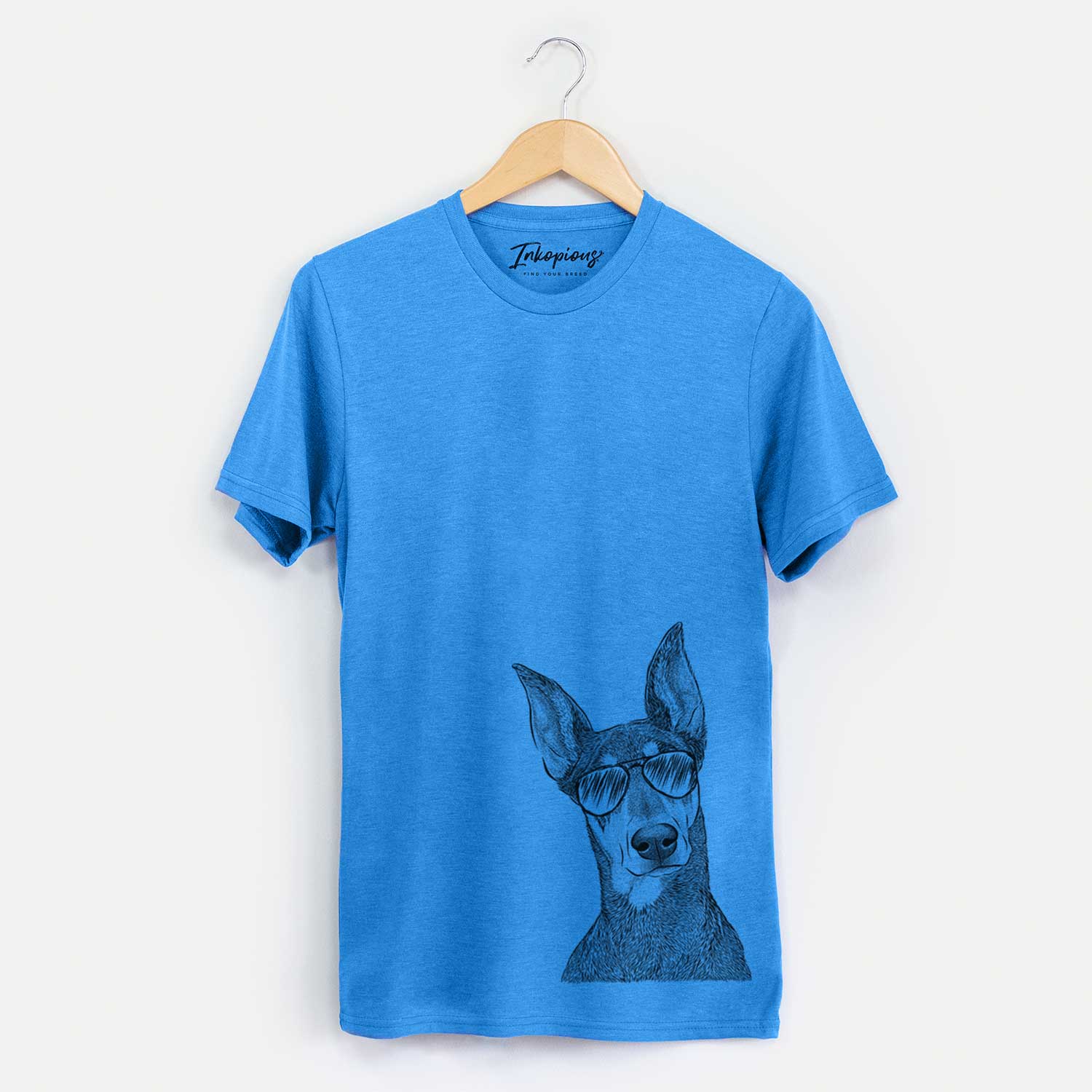 Hand-drawn sketch of Jenna the Doberman Pinscher wearing aviator sunglasses on a Blue Unisex crewneck