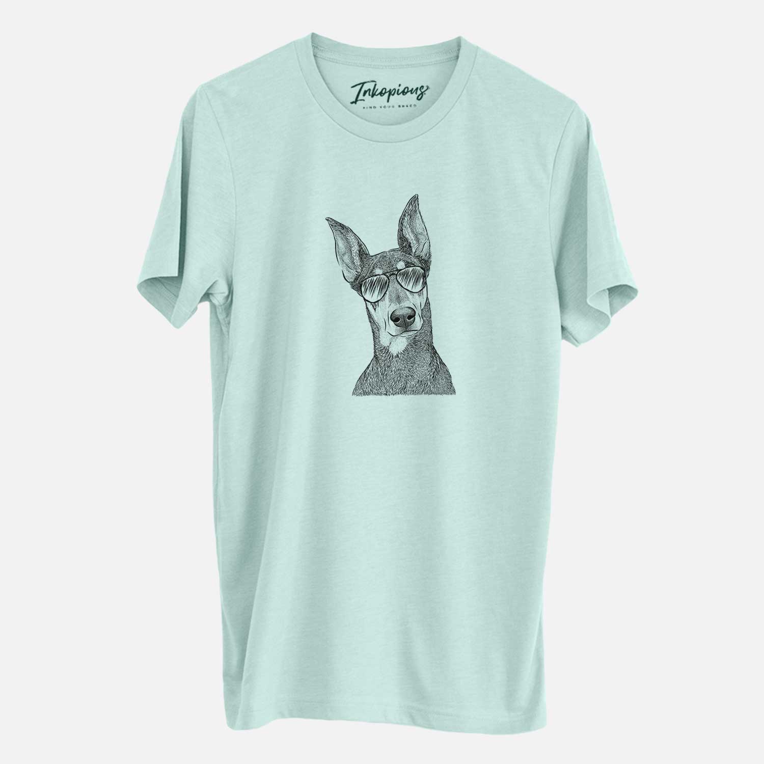 Hand-drawn sketch of Jenna the Doberman Pinscher wearing aviator sunglasses on a Heather Sage Unisex crewneck