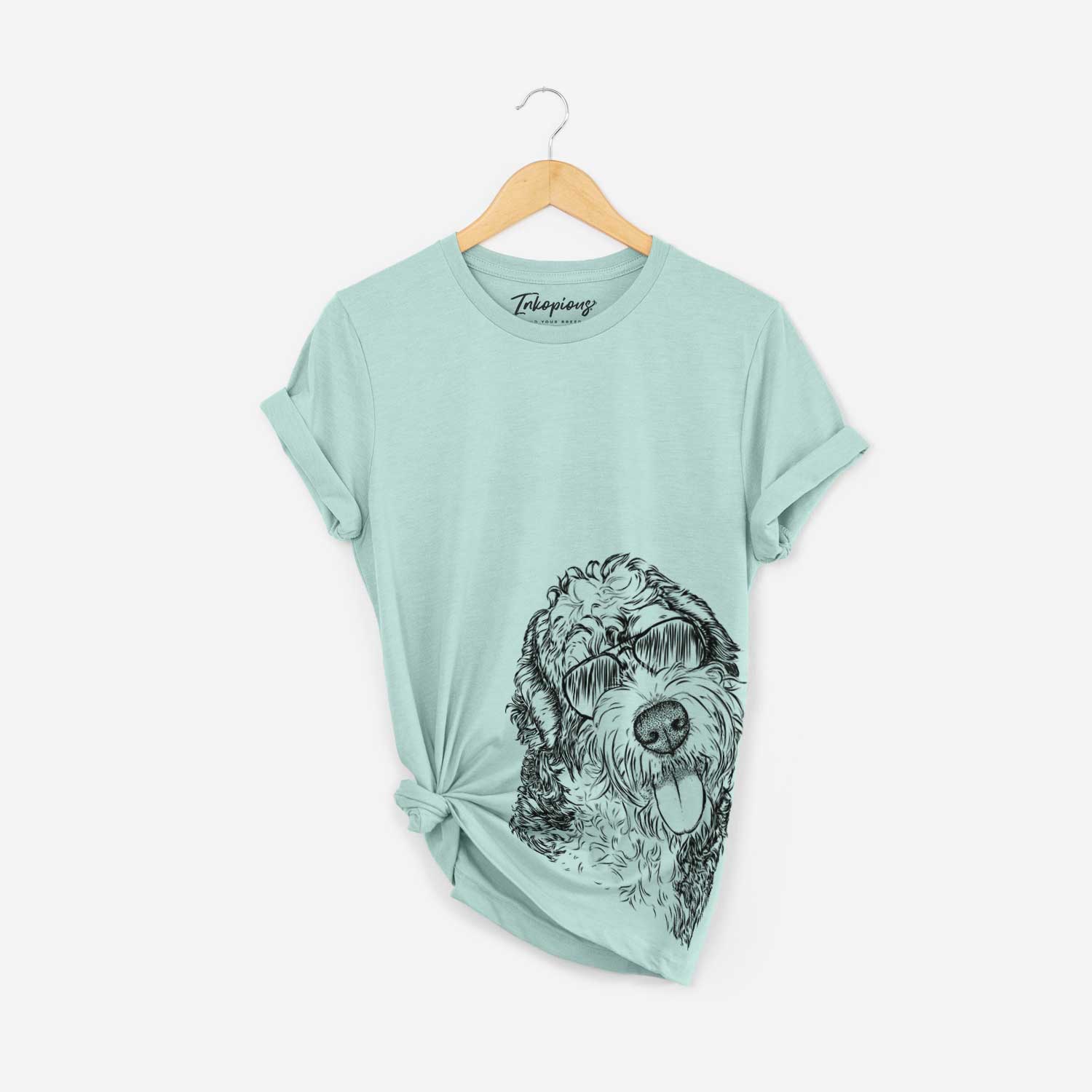 Hand-drawn sketch of Kaci the Bernedoodle wearing aviator sunglasses on a Heather Sage Bella Canvas Unisex Crewneck