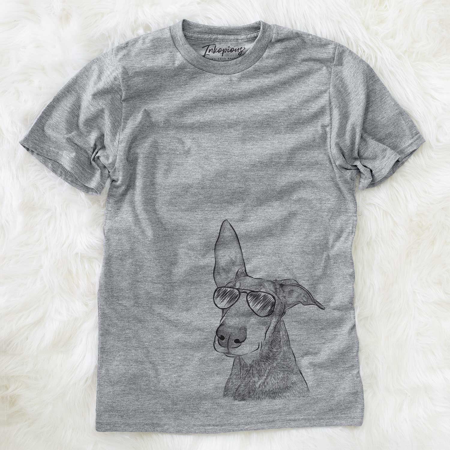 Hand-drawn sketch of Kain the Doberman Pinscher wearing aviator sunglasses on a Grey Unisex crewneck