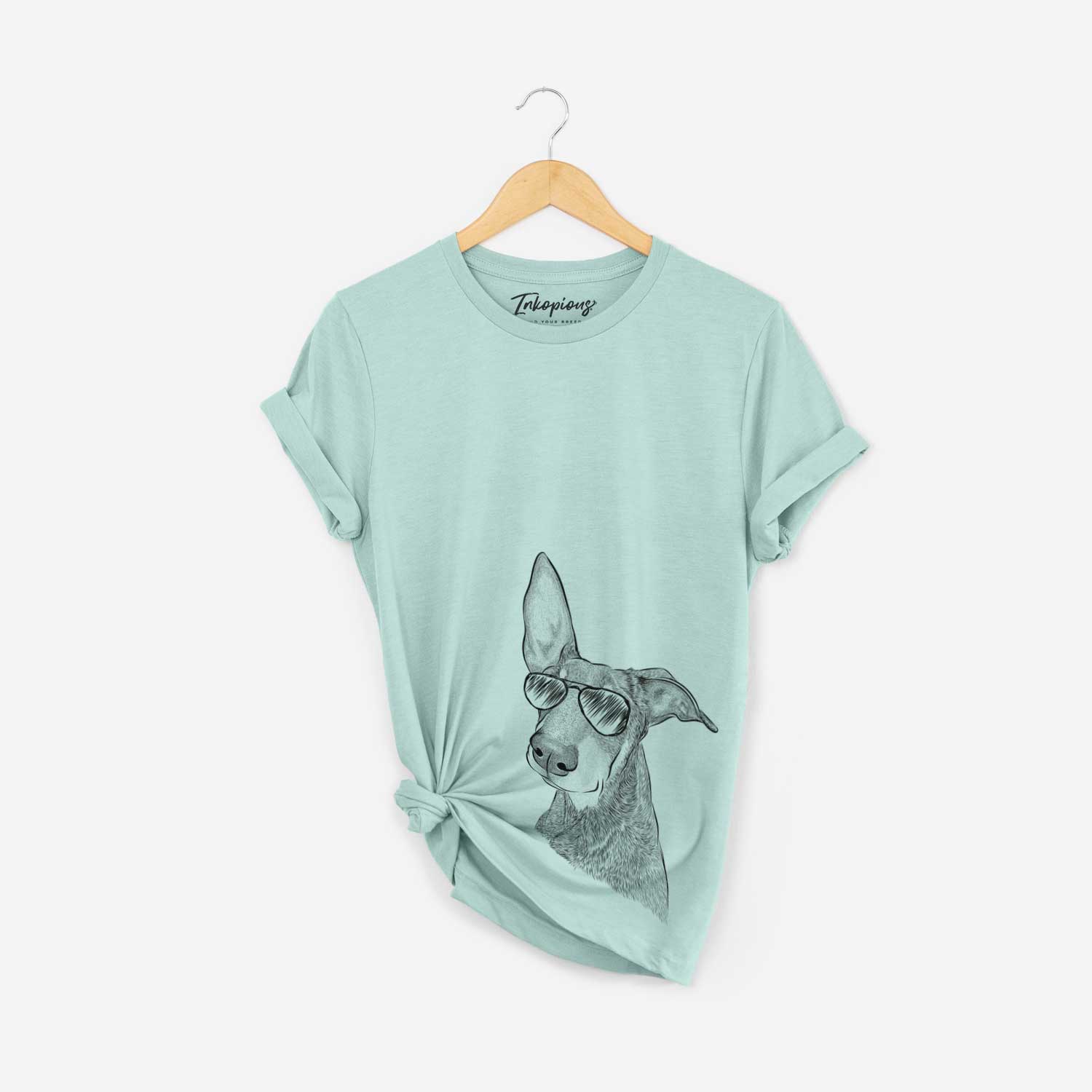 Hand-drawn sketch of Kain the Doberman Pinscher wearing aviator sunglasses on a Heather Sage Bella Canvas Unisex Crewneck