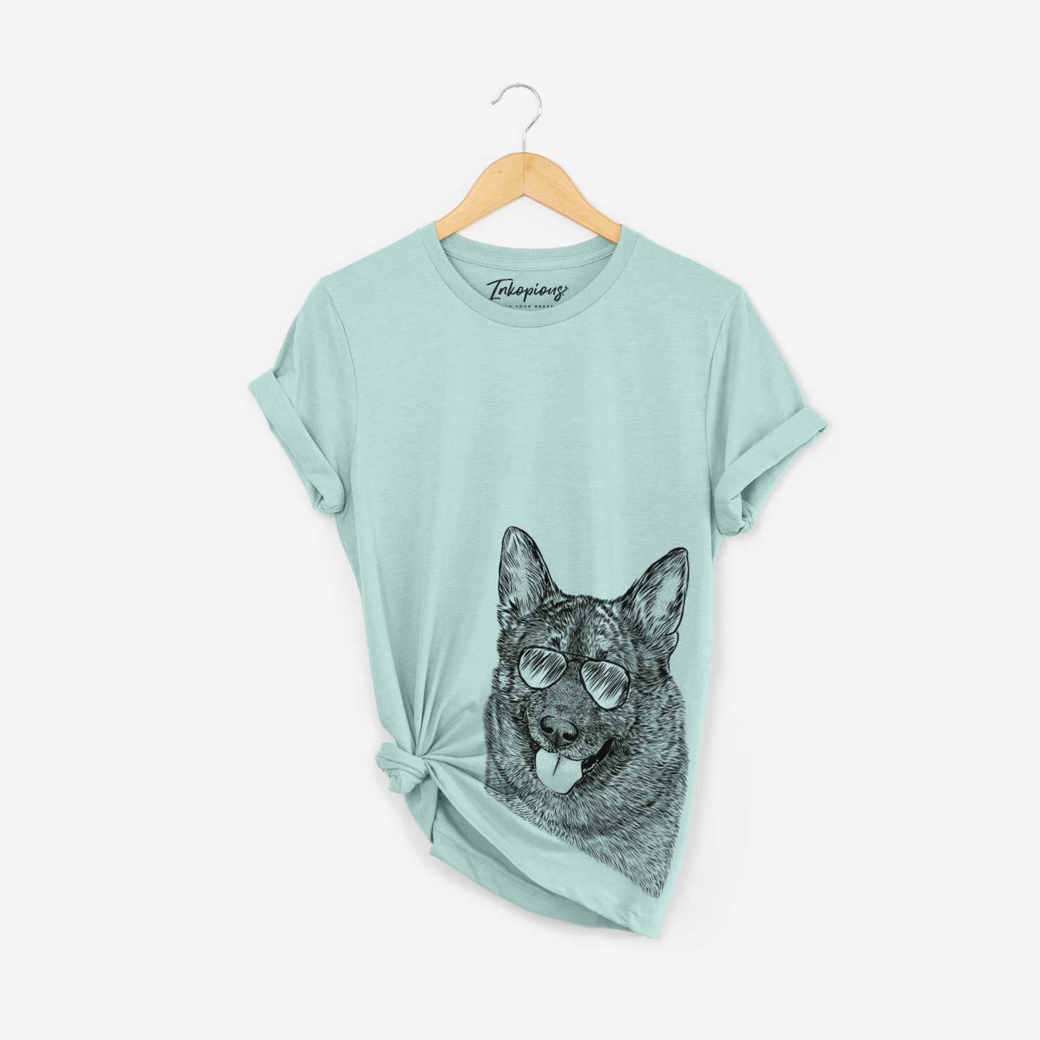 Hand-drawn sketch of Kasia the Norwegian Elkhound wearing aviator sunglasses on a Heather Sage Bella Canvas Unisex Crewneck