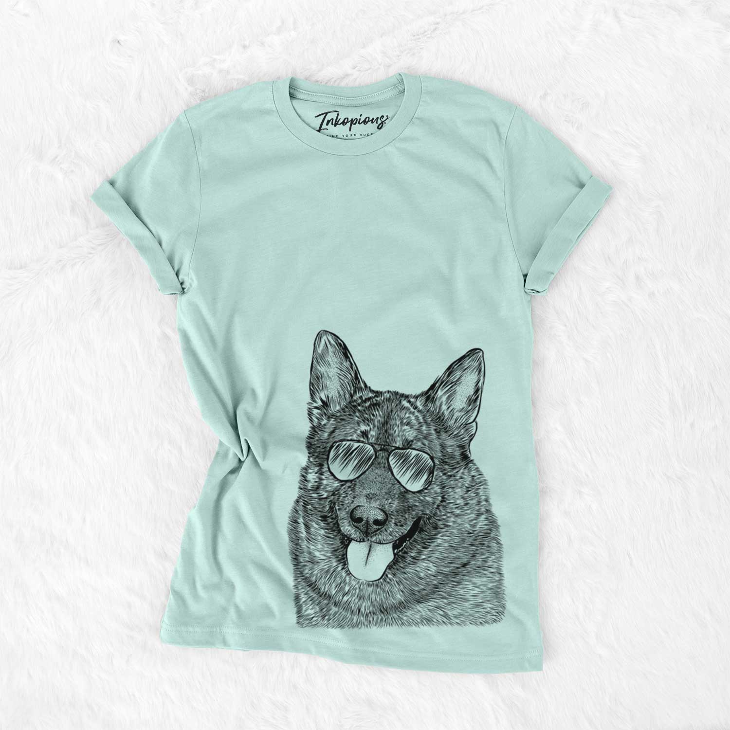 Hand-drawn sketch of Kasia the Norwegian Elkhound wearing aviator sunglasses on a Heather Sage Unisex crewneck