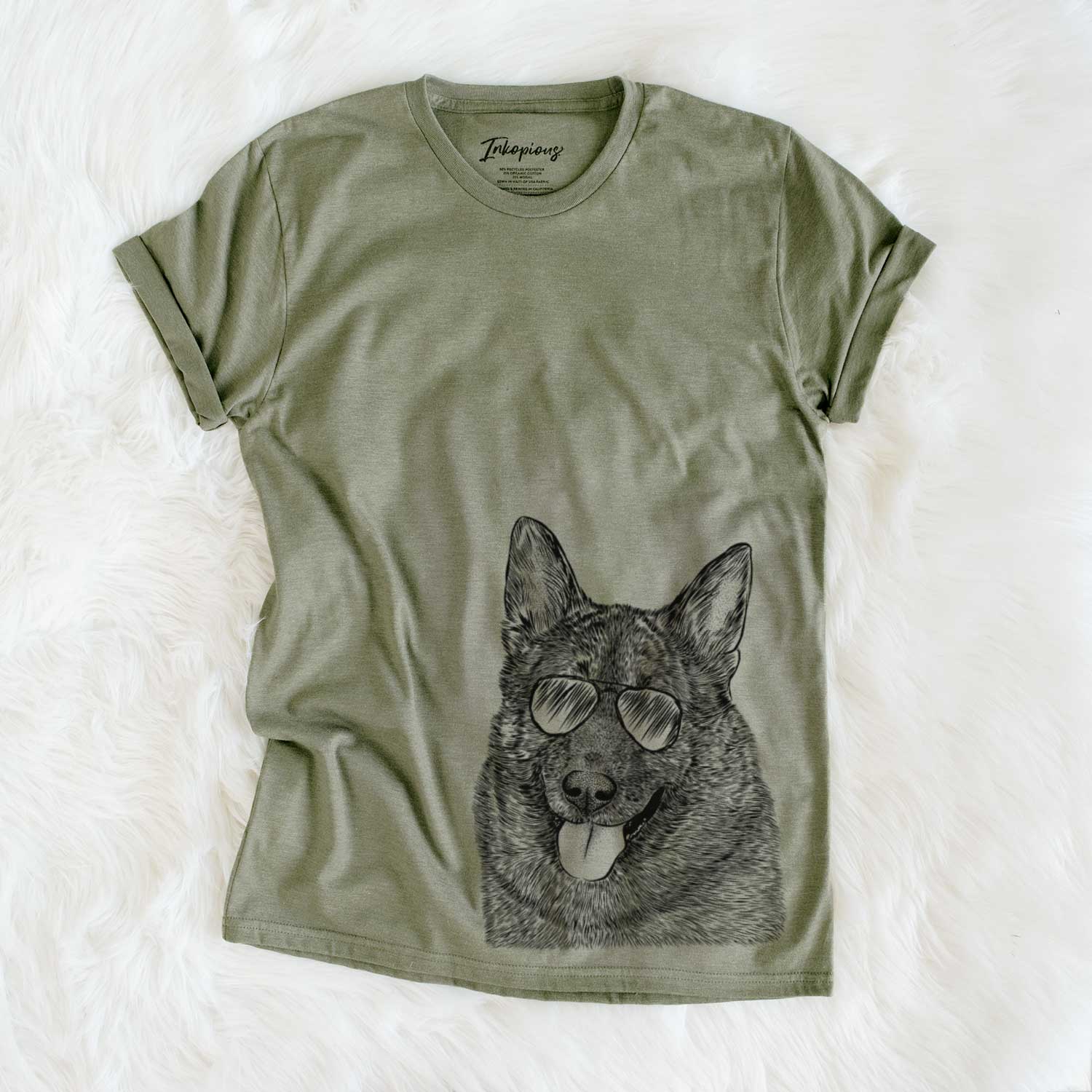Hand-drawn sketch of Kasia the Norwegian Elkhound wearing aviator sunglasses on an Olive Unisex crewneck