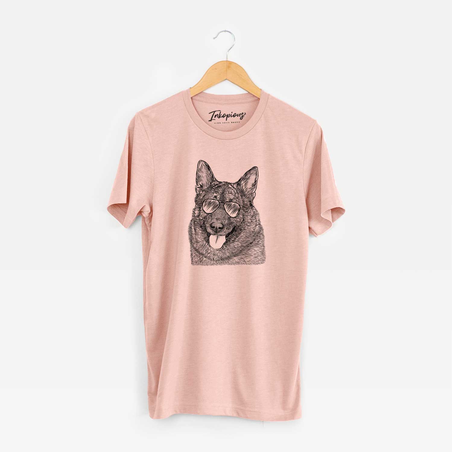 Hand-drawn sketch of Kasia the Norwegian Elkhound wearing aviator sunglasses on a Peach Unisex crewneck