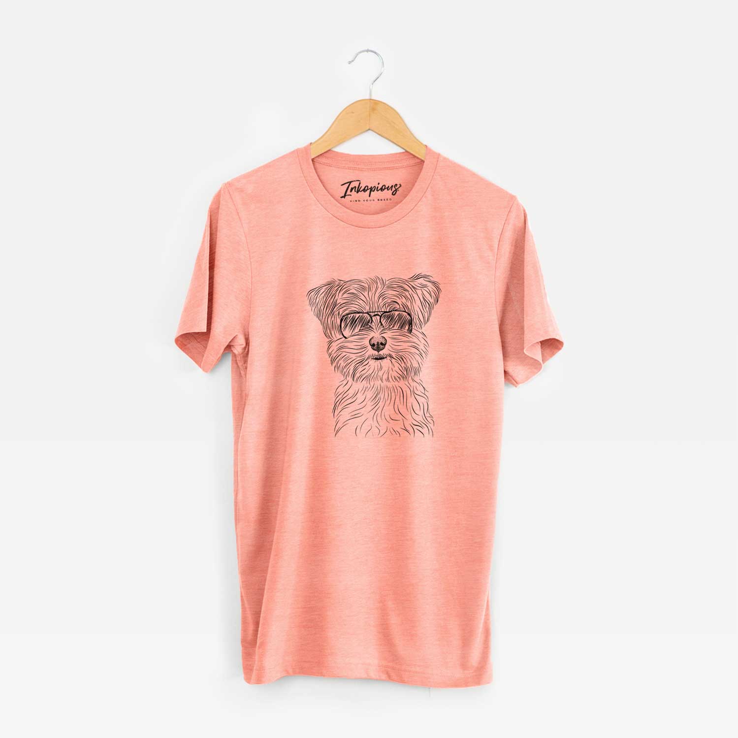 Hand-drawn sketch of Kiwi the Morkie wearing aviator sunglasses on a Sunset Unisex crewneck