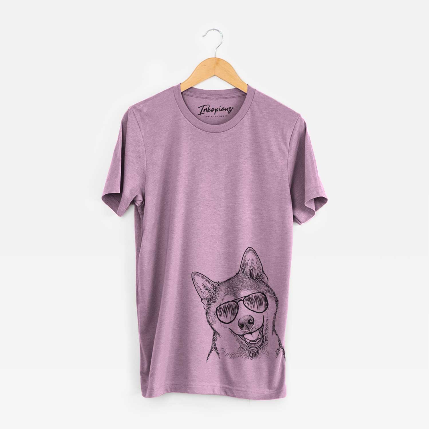 Hand-drawn sketch of Koby the Shiba Inu wearing aviator sunglasses on an Orchid Unisex crewneck