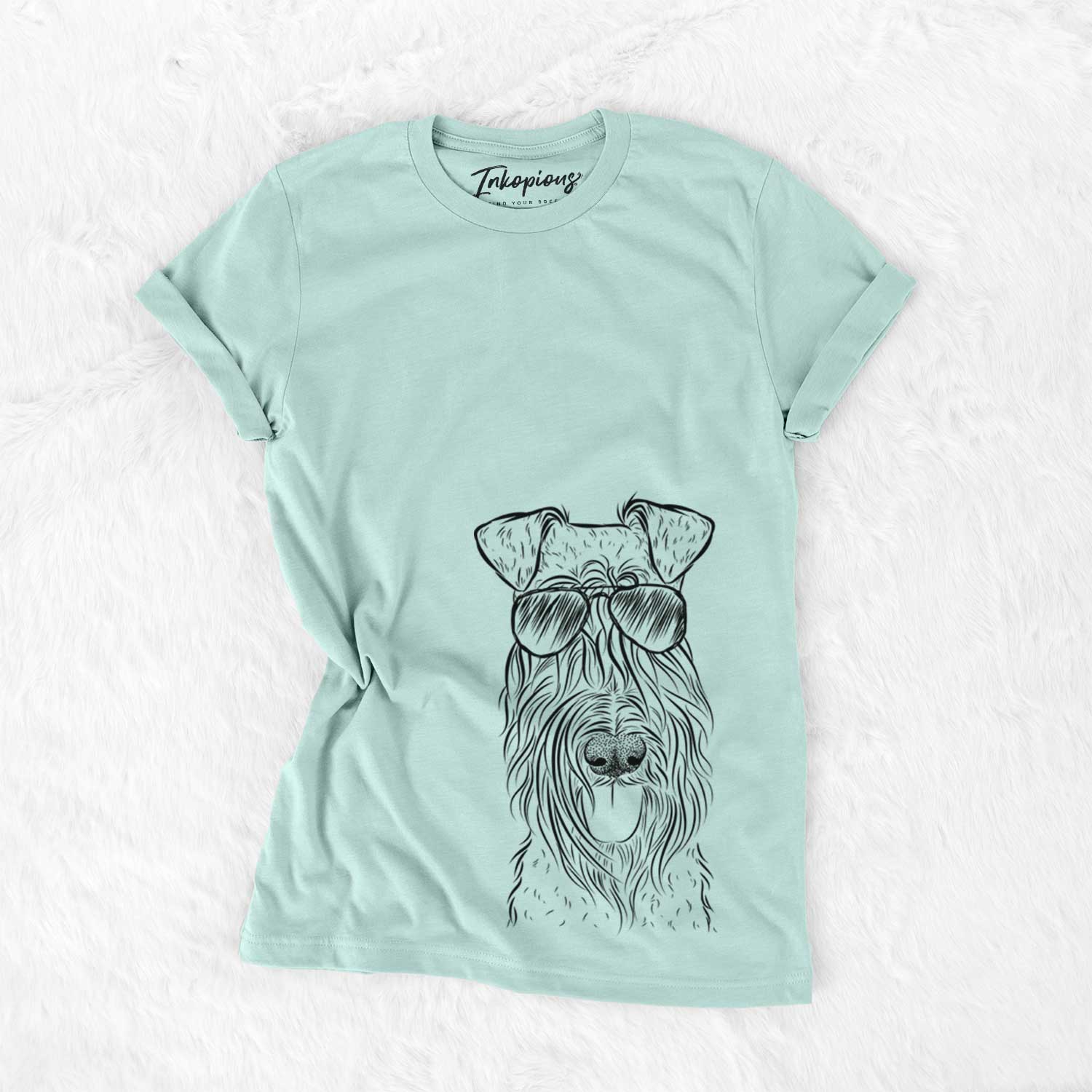 Hand-drawn sketch of Kricket the Kerry Blue Terrier wearing aviator sunglasses on a Heather Sage Unisex crewneck