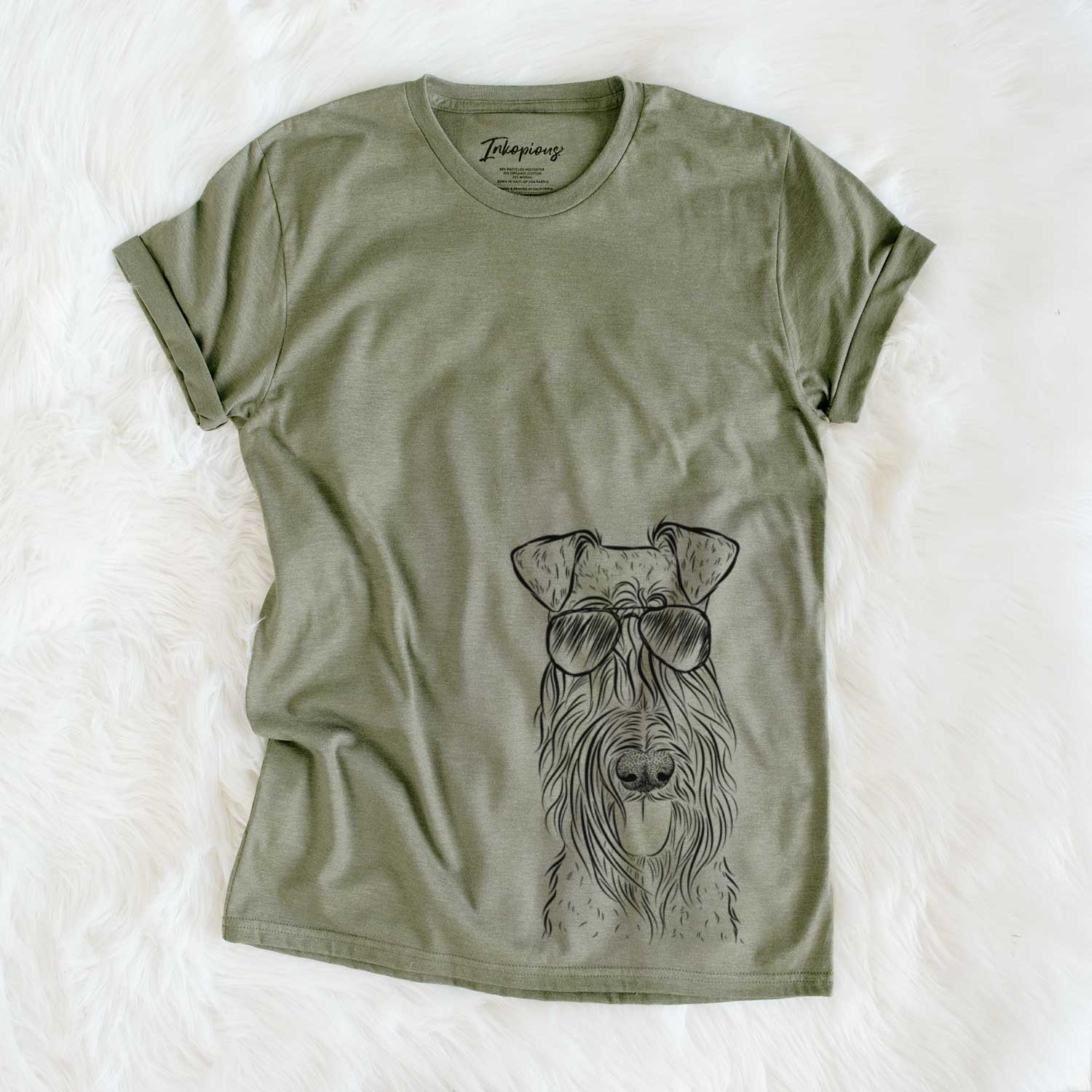 Hand-drawn sketch of Kricket the Kerry Blue Terrier wearing aviator sunglasses on an Olive Unisex crewneck