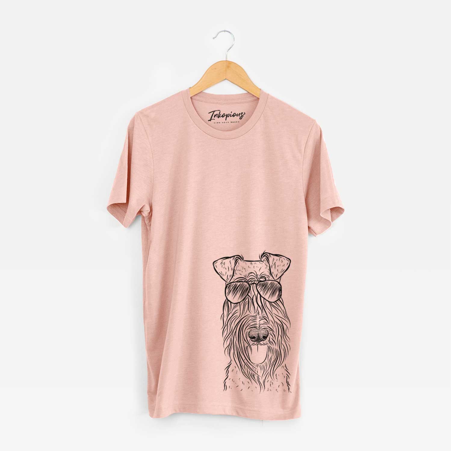 Hand-drawn sketch of Kricket the Kerry Blue Terrier wearing aviator sunglasses on a Peach Bella Canvas Unisex Crewneck