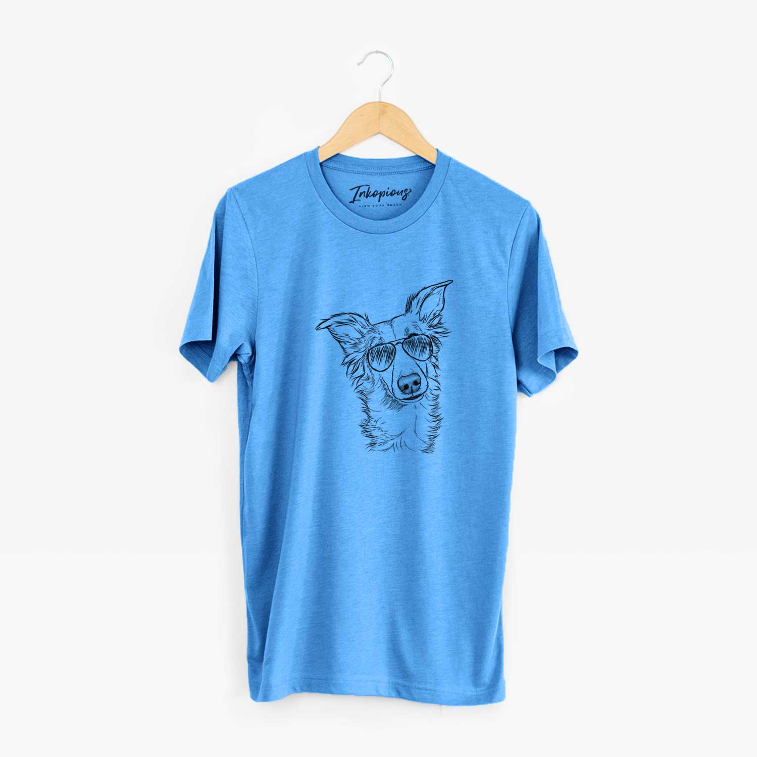 Hand-drawn sketch of Kyu the Windsprite wearing aviator sunglasses on a Blue Unisex crewneck