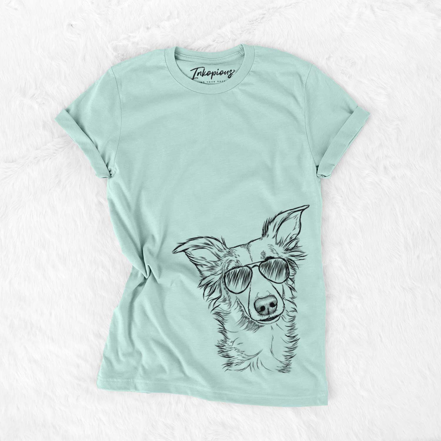 Hand-drawn sketch of Kyu the Windsprite wearing aviator sunglasses on a Heather Sage Unisex crewneck