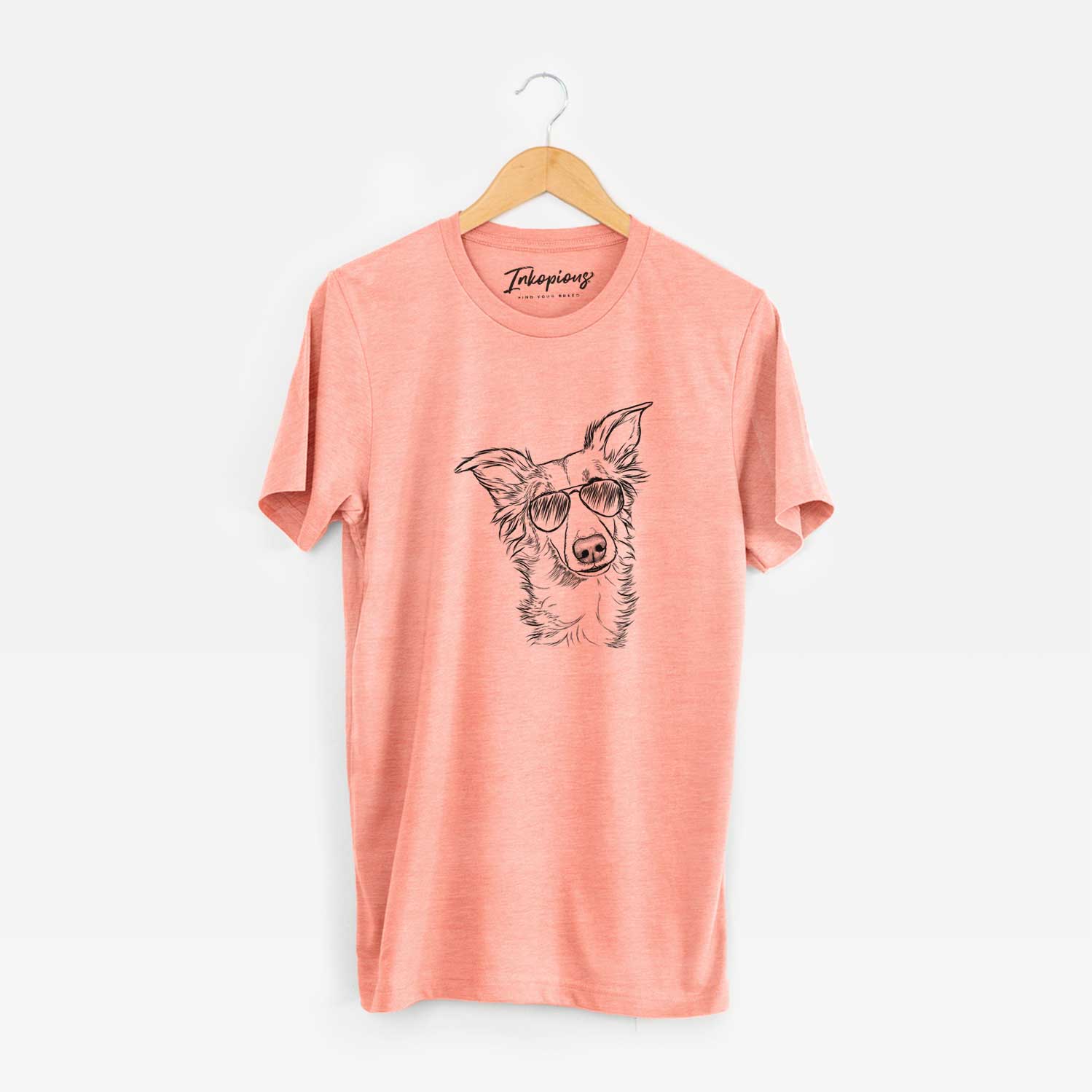 Hand-drawn sketch of Kyu the Windsprite wearing aviator sunglasses on a Sunset Unisex crewneck