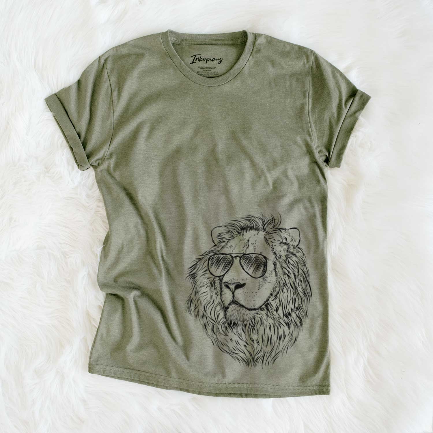 Hand-drawn sketch of Lenny the Lion wearing aviator sunglasses on an Olive Unisex crewneck