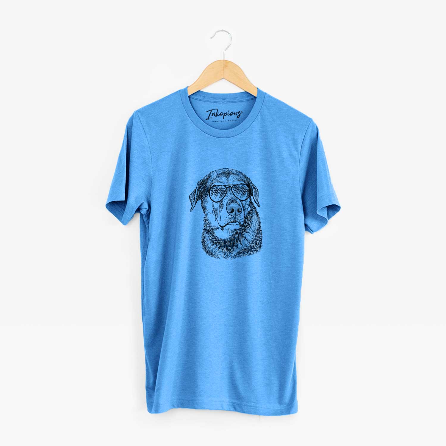Hand-drawn sketch of Lobo the Shepherd Mix wearing aviator sunglasses on a Blue Unisex crewneck