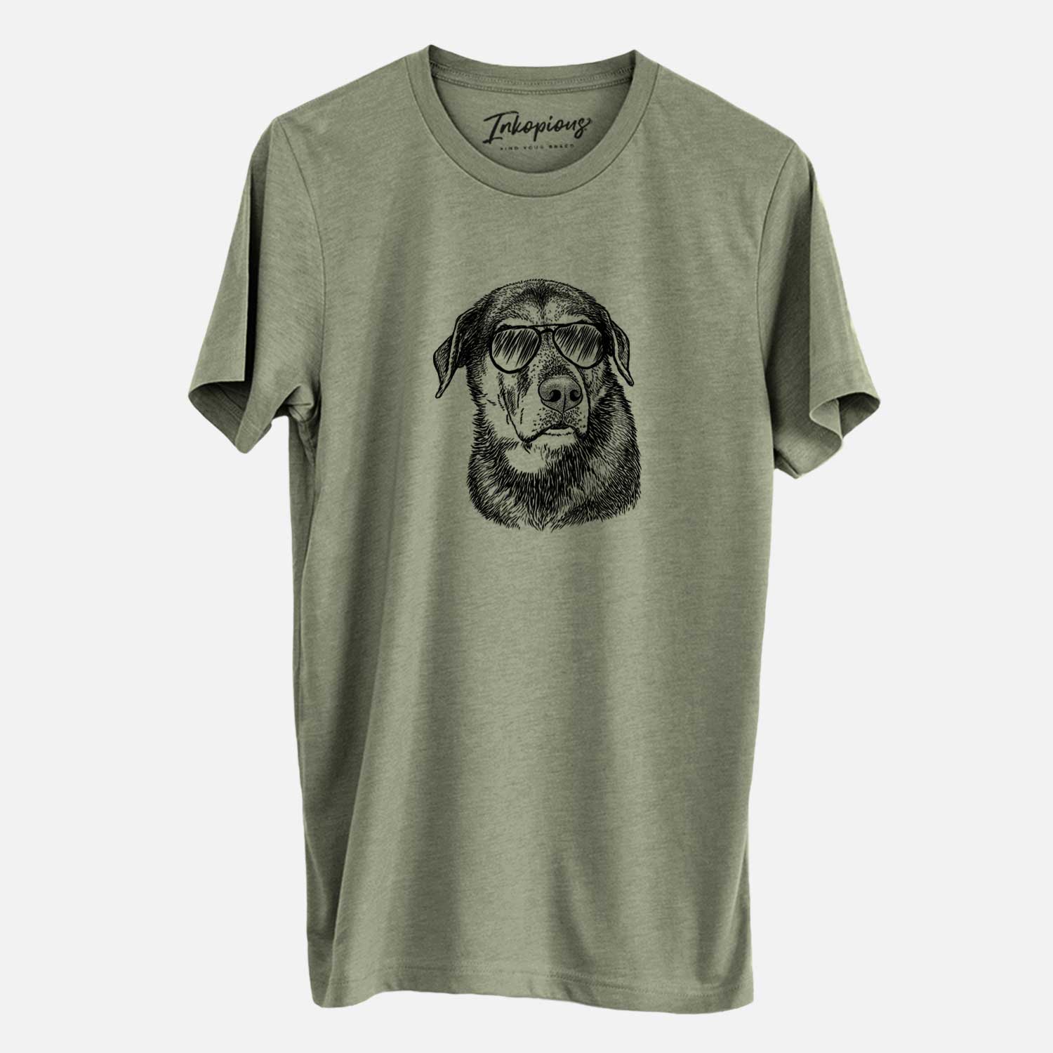 Hand-drawn sketch of Lobo the Shepherd Mix wearing aviator sunglasses on an Olive Unisex crewneck