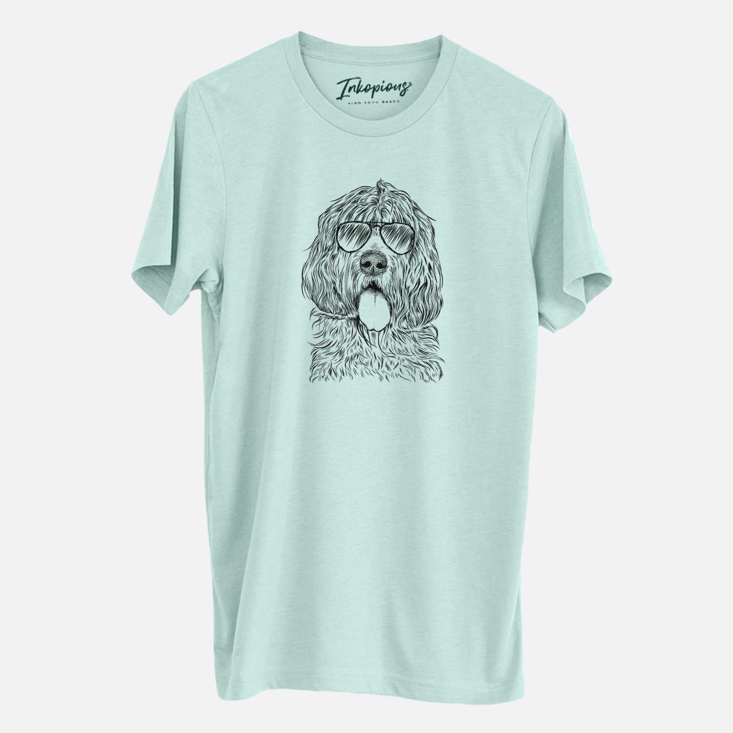 Hand-drawn sketch of Lou the Otterhound wearing aviator sunglasses on a Heather Sage Unisex crewneck
