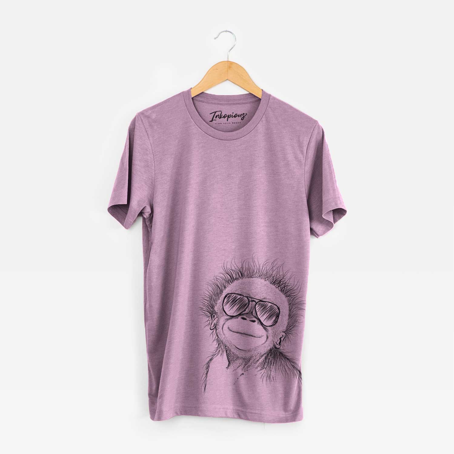 Hand-drawn sketch of Louie the Baby Orangutan wearing aviator sunglasses on an Orchid Bella Canvas Unisex Crewneck
