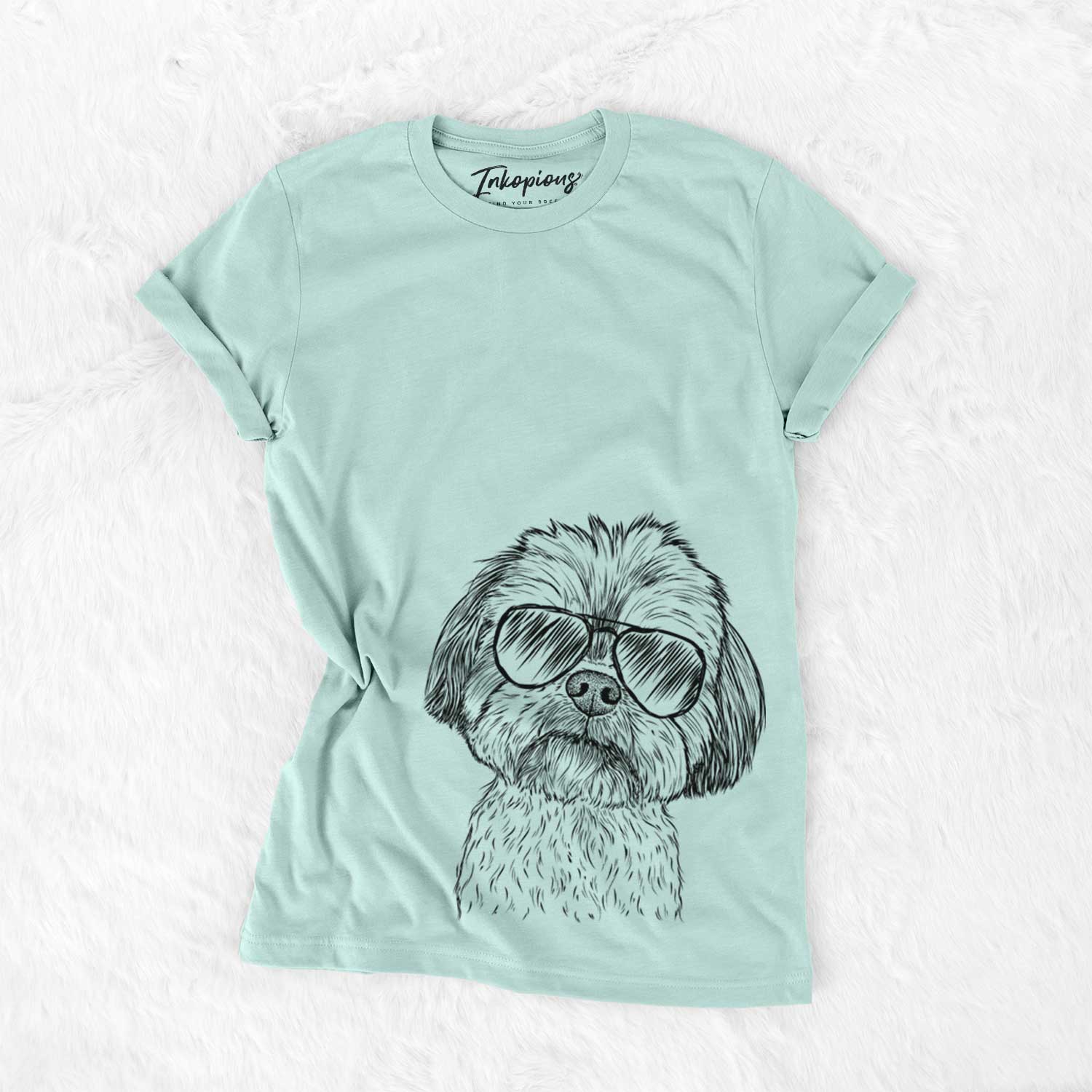 Hand-drawn sketch of Lucy the Shorkie wearing aviator sunglasses on a Heather Sage Unisex crewneck