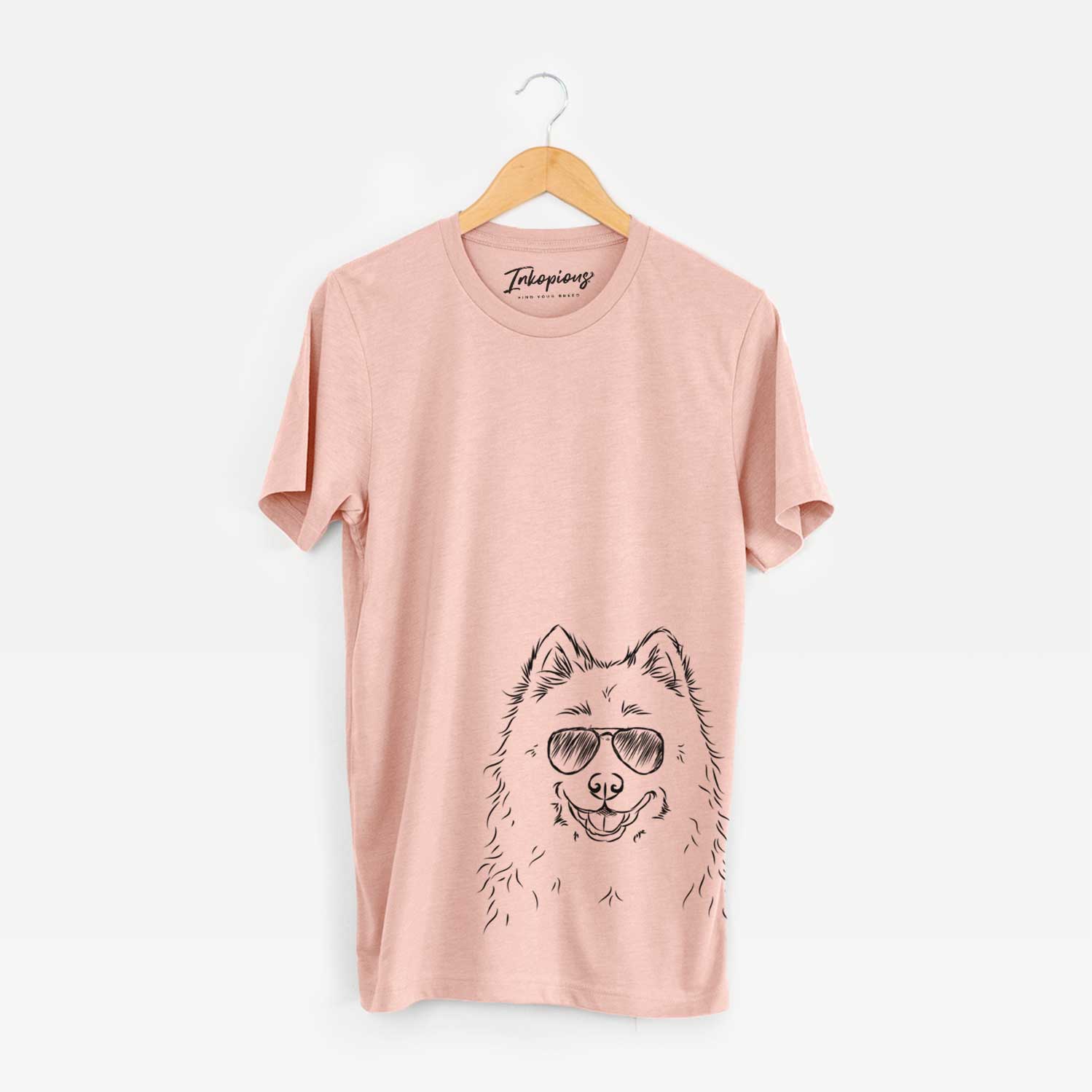 Hand-drawn sketch of Luka the Samoyed wearing aviator sunglasses on a Peach Bella Canvas Unisex Crewneck