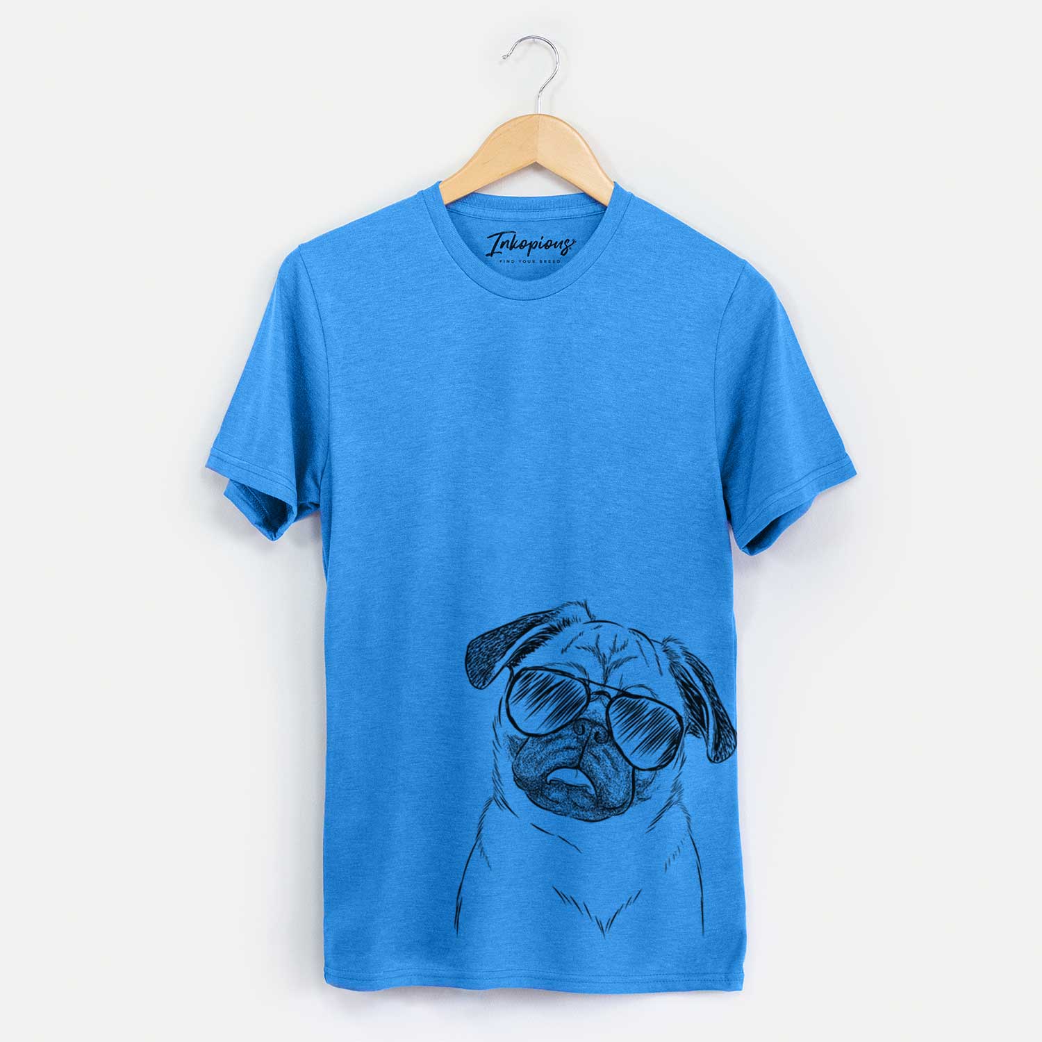 Hand-drawn sketch of Macy the Pug wearing aviator sunglasses on a Blue Unisex crewneck