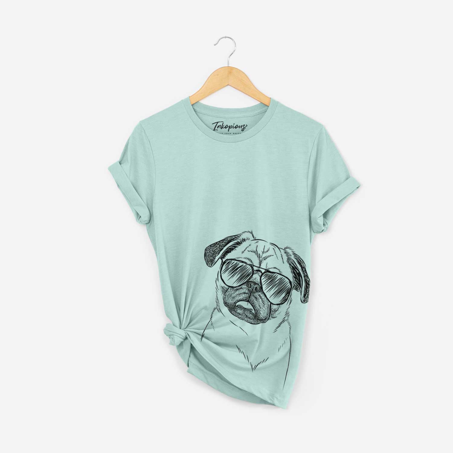 Hand-drawn sketch of Macy the Pug wearing aviator sunglasses on a Heather Sage Bella Canvas Unisex Crewneck
