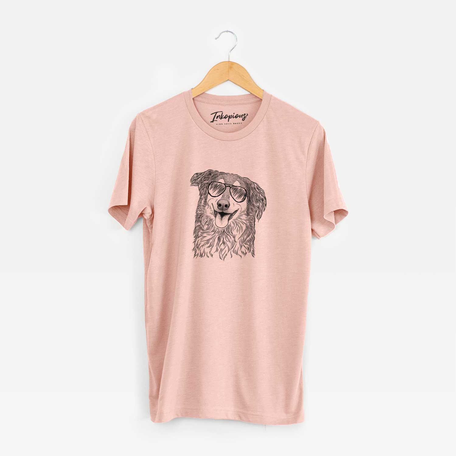 Hand-drawn sketch of Maddie the English Shepherd wearing aviator sunglasses on a Peach Unisex crewneck