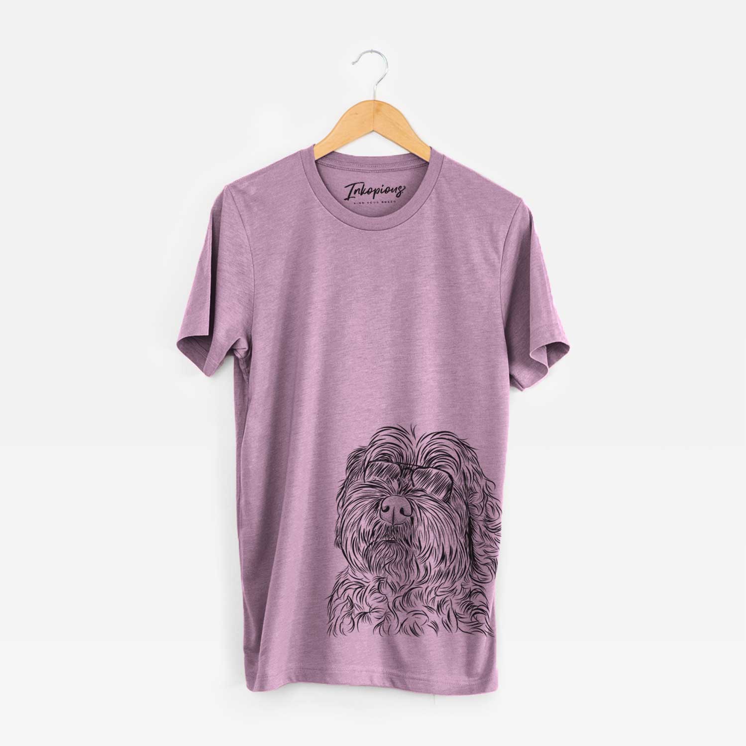 Hand-drawn sketch of Maggie Girl the Cockapoo wearing aviator sunglasses on an Orchid Unisex crewneck
