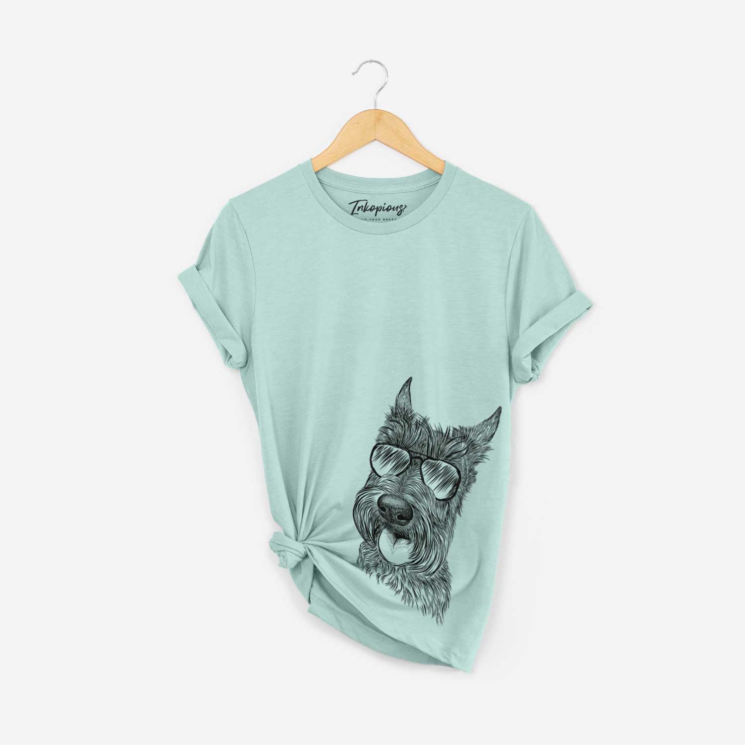Hand-drawn sketch of Magnus the Scottish Terrier wearing aviator sunglasses on a Heather Sage Bella Canvas Unisex Crewneck