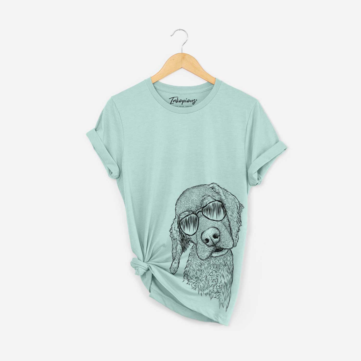Hand-drawn sketch of Mambo #5 the Cocker Spaniel wearing aviator sunglasses on a Heather Sage Bella Canvas Unisex Crewneck