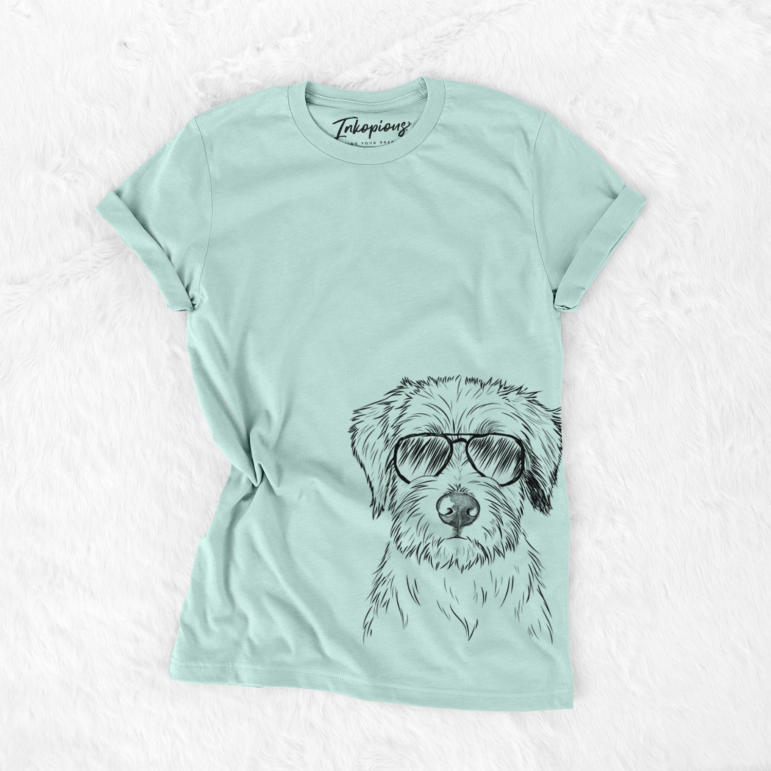 Hand-drawn sketch of Marek the Bernedoodle wearing aviator sunglasses on a Heather Sage Unisex crewneck