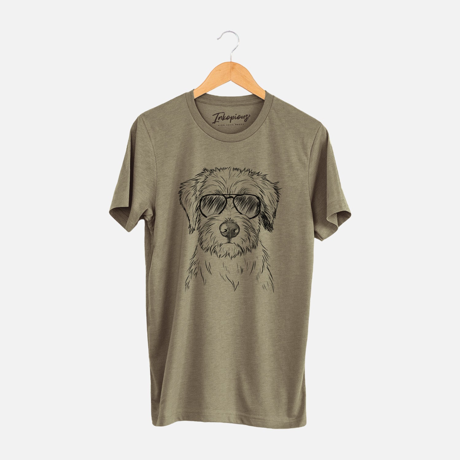 Hand-drawn sketch of Marek the Bernedoodle wearing aviator sunglasses on an Olive Unisex crewneck