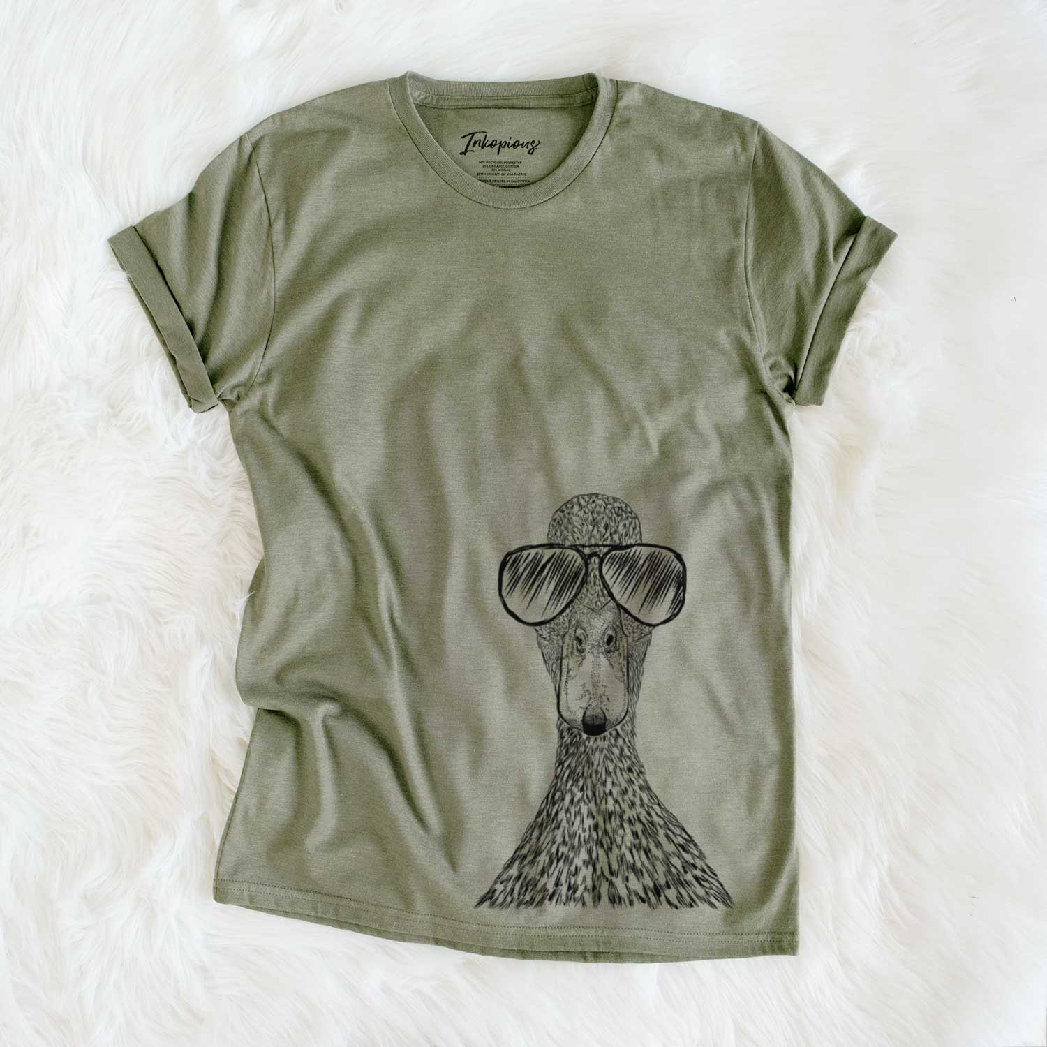 Hand-drawn sketch of Marge the Mallard Duck wearing aviator sunglasses on an Olive Unisex crewneck