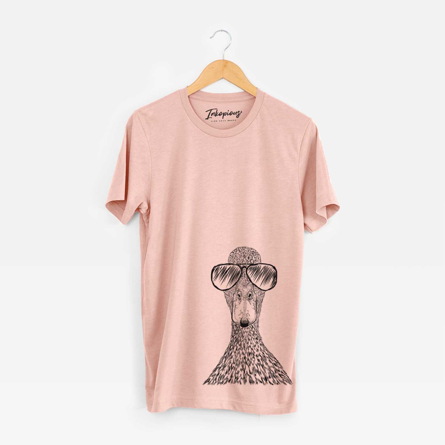 Hand-drawn sketch of Marge the Mallard Duck wearing aviator sunglasses on a Peach Unisex crewneck